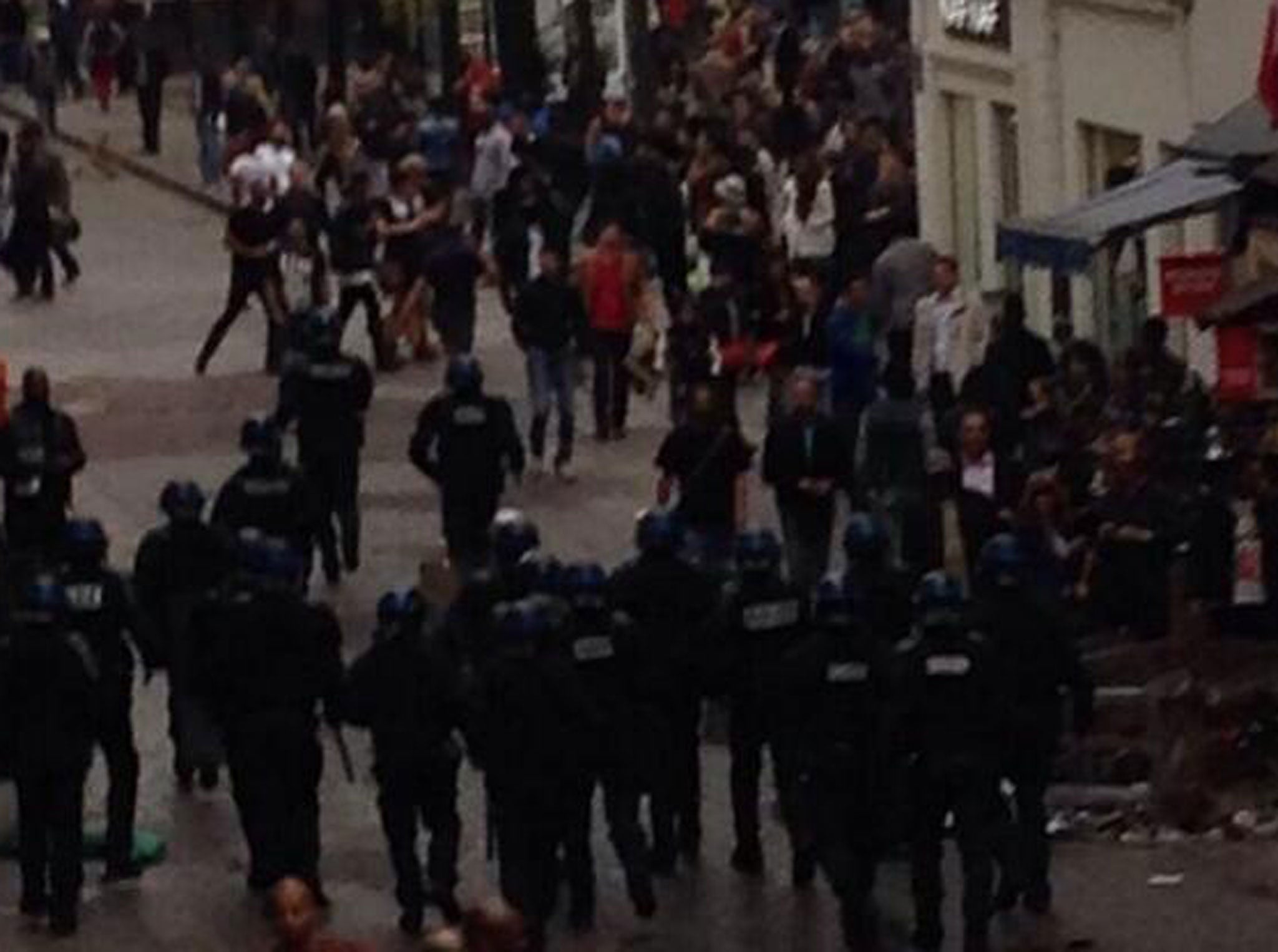 Police arrive at the scene in Paris on Wednesday afternoon