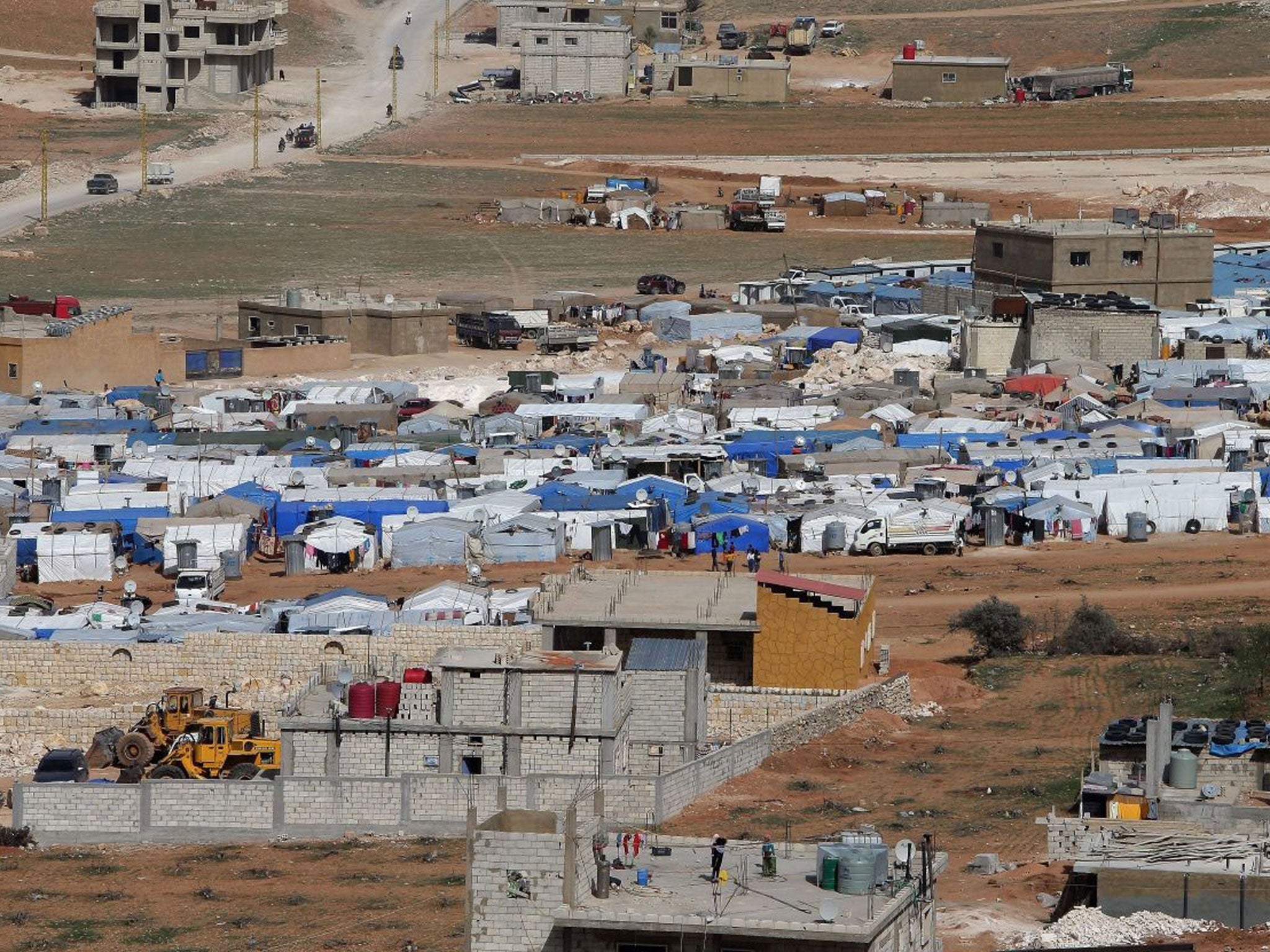 Tents housing Syrian refugees in the city of Arsal in Lebanon's Bekaa valley