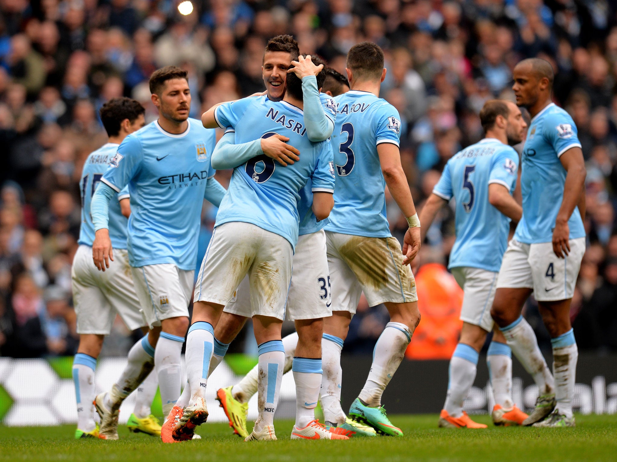 Stevan Jovetic is congratulated by Samir Nasri after scoring City's fourth in the 4-1 win over Southampton