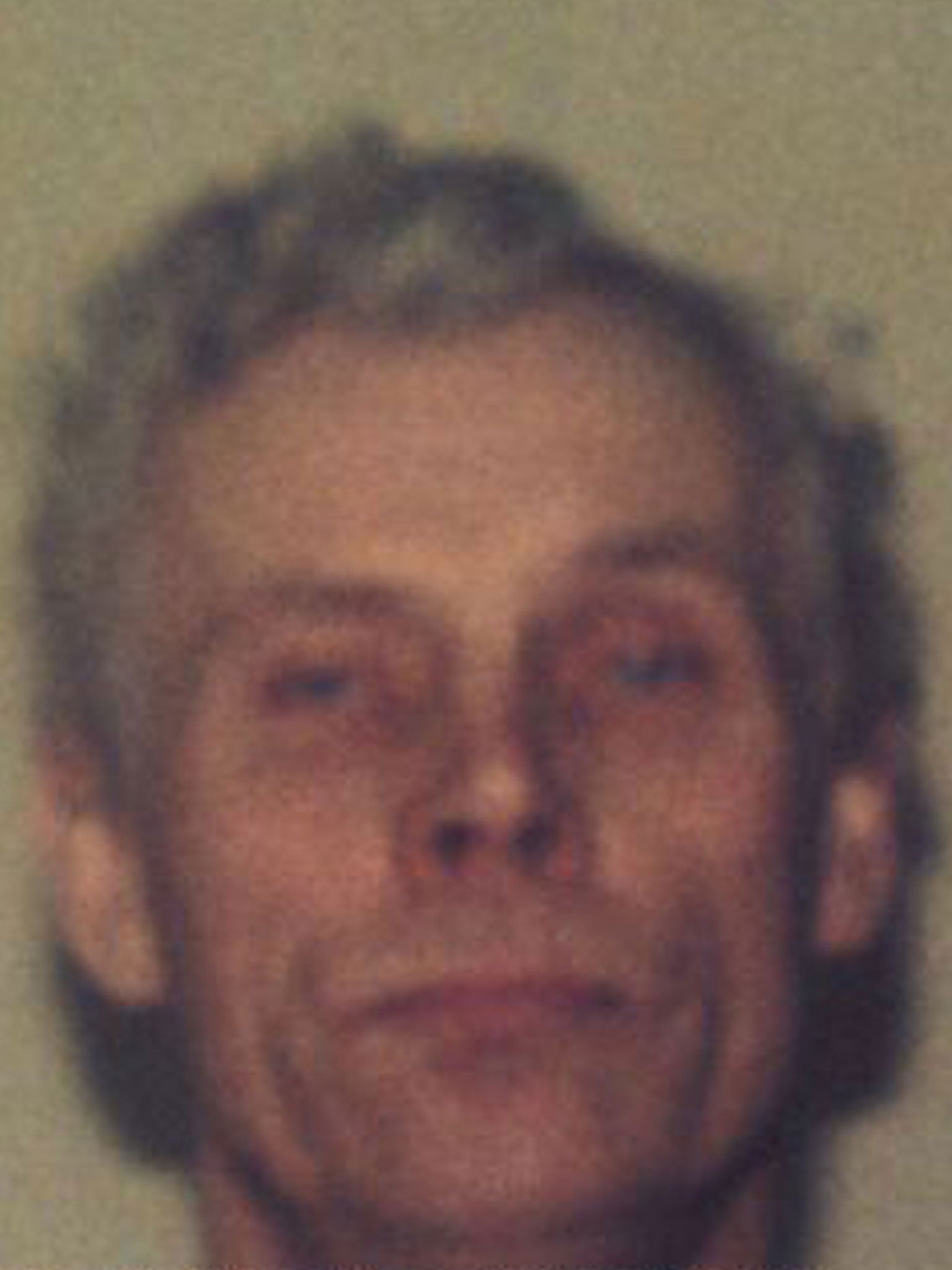 A photo of Houchin released by police after he fled prison in 1993