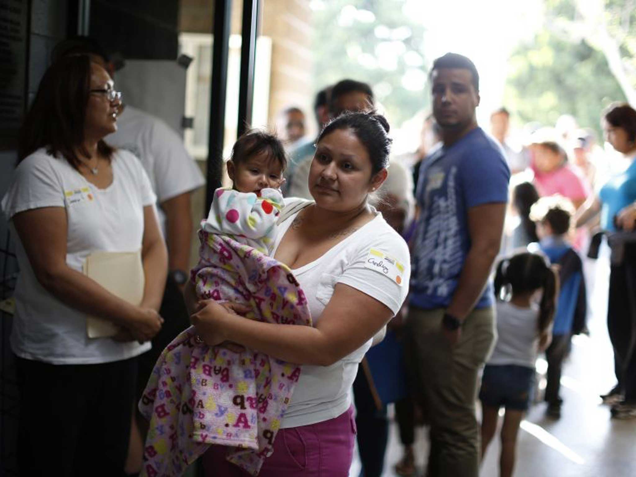 Worth the wait: Californians queue to sign up for Obamacare, which is growing in popularity