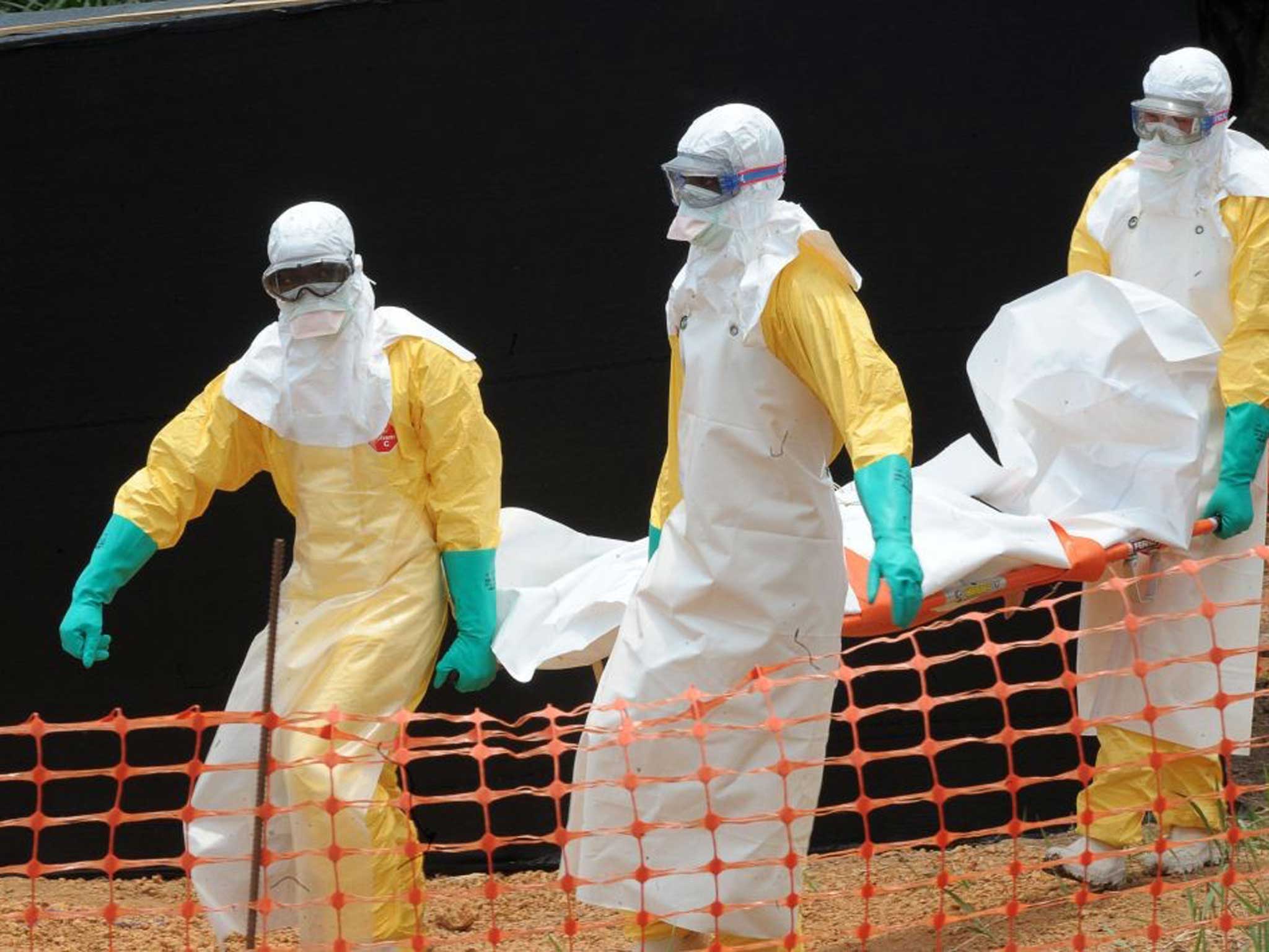 Staff of the 'Doctors without Borders' ('Medecin sans frontieres') medical aid organisation carry the body of a person killed