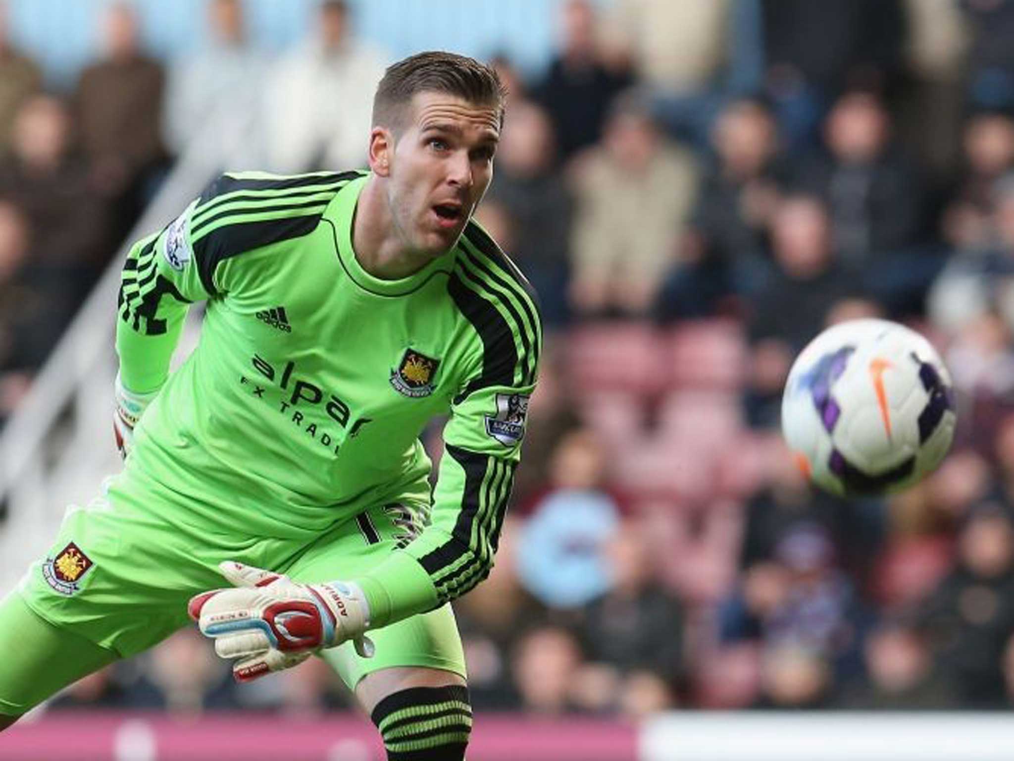 Adrian of West Ham United watches the ball loop over his head for Wayne Rooney's long range first goal