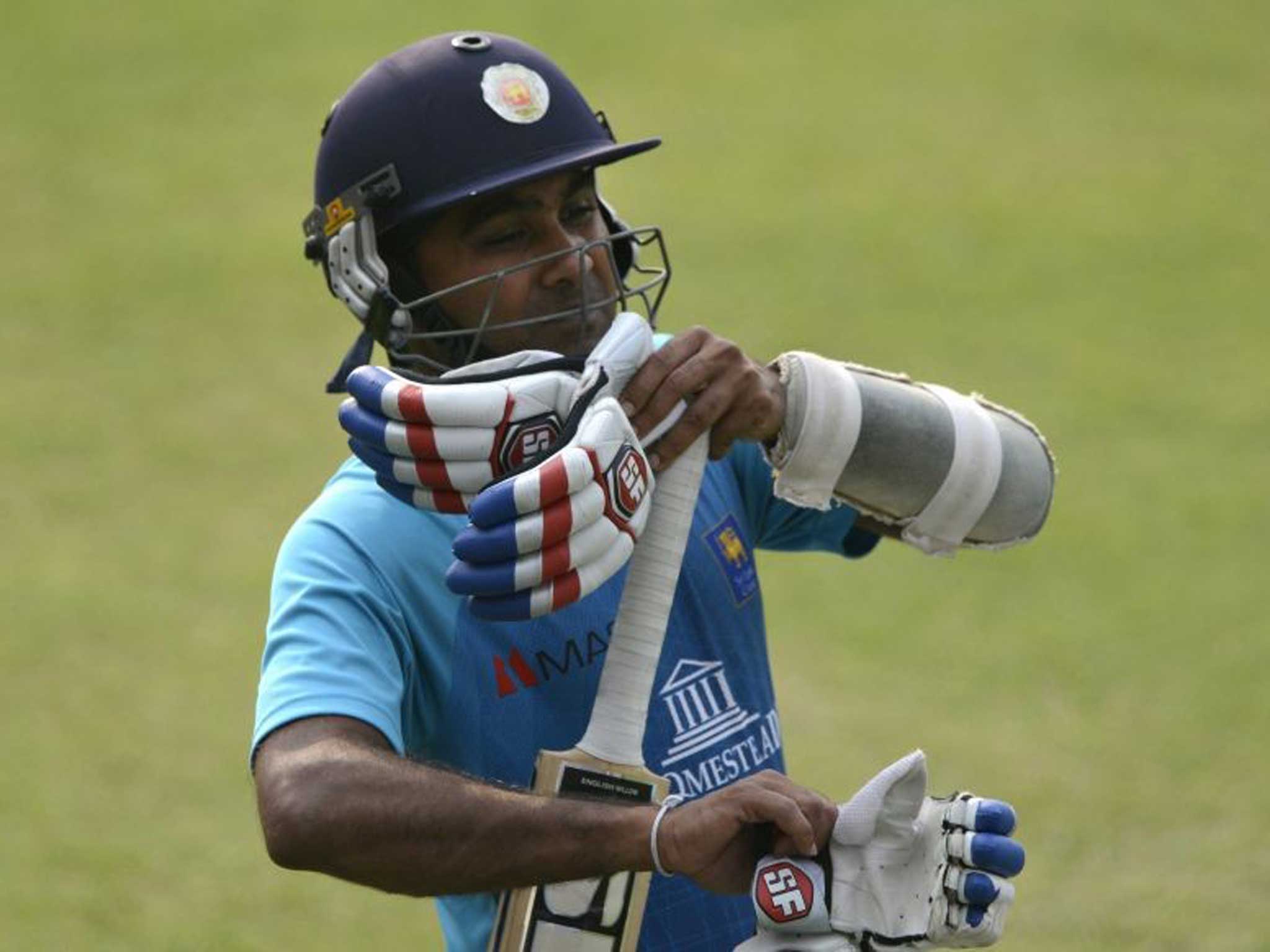 Mahela Jayawardene prepares to bat during a training session