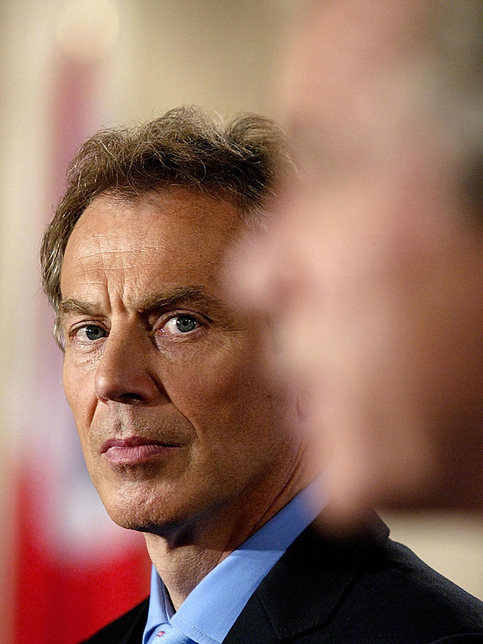 Tony Blair and George Bush at a joint press conference in the Cross Hall of the White House on 17 July 2003 in Washington, DC