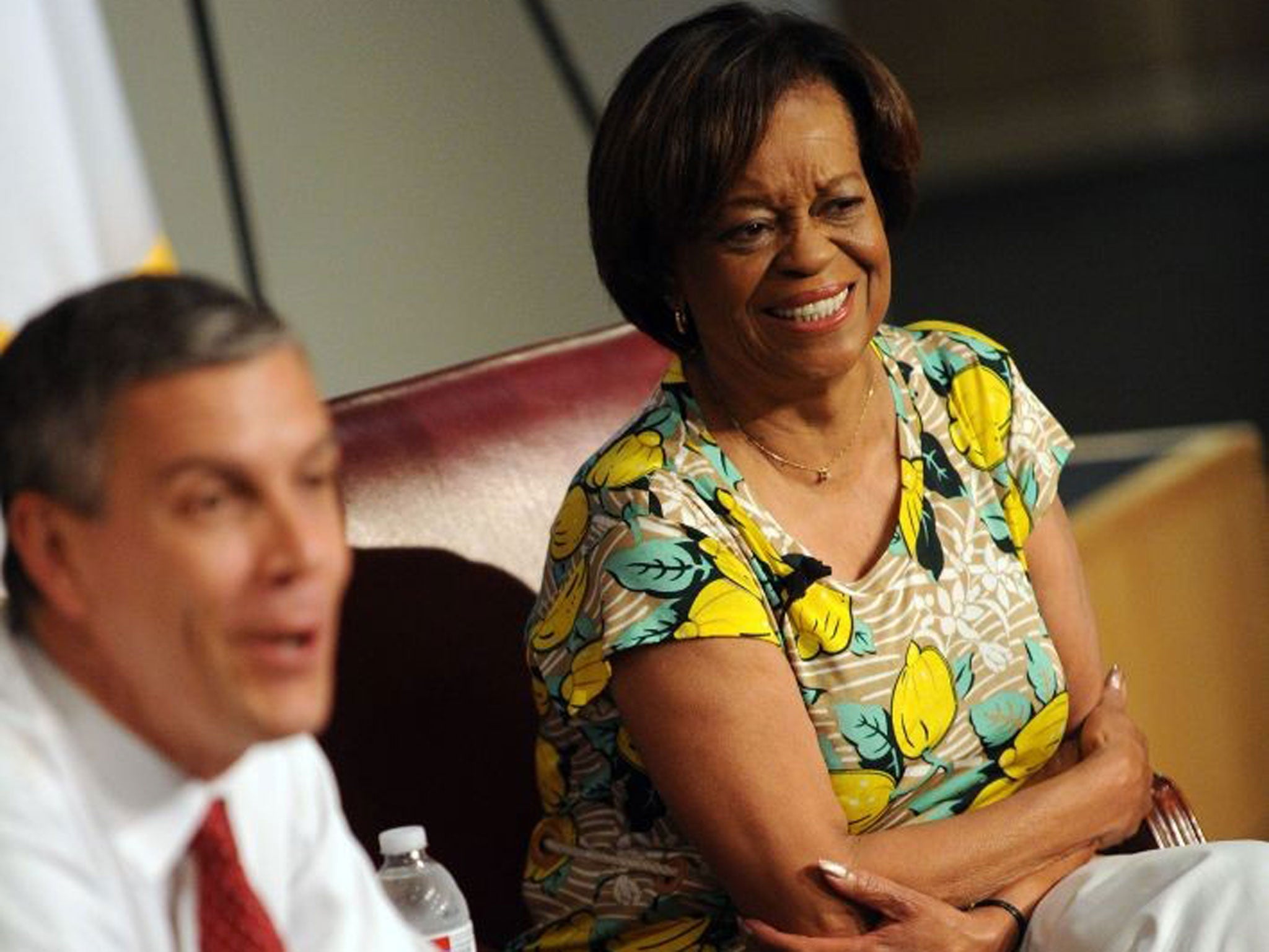 US Education Secretary Arne Duncan (L) and Marian Robinson, mother of first lady Michelle Obama, answer questions at a reading session for local children as part of the "Let's Read Let's Move"