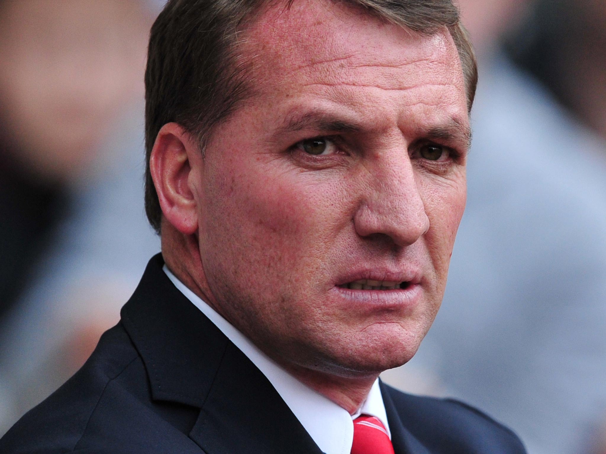 Liverpool manager Brendan Rodgers looks on from the touchline