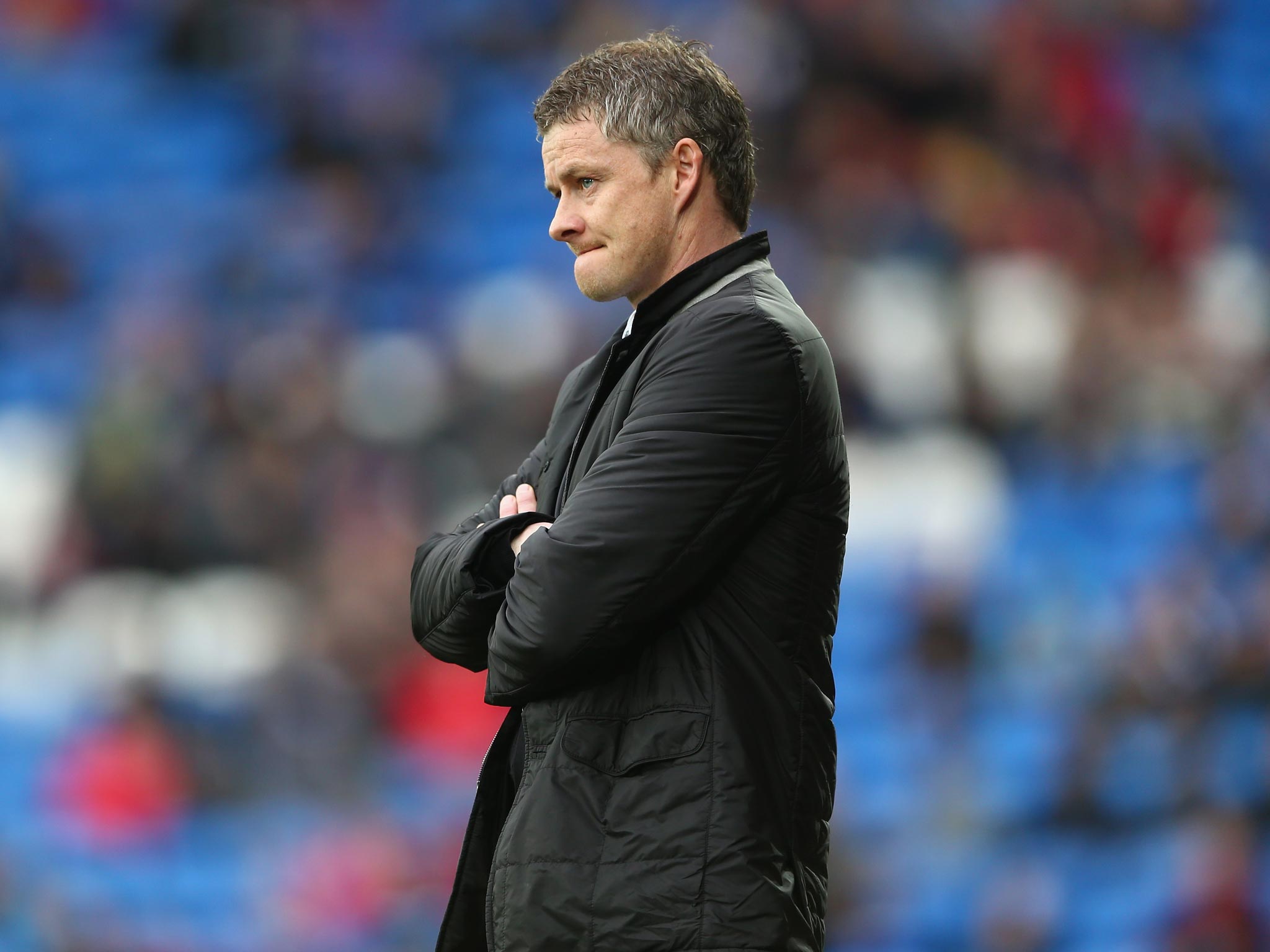 Ole Gunnar Solskjaer looks on from the touchline