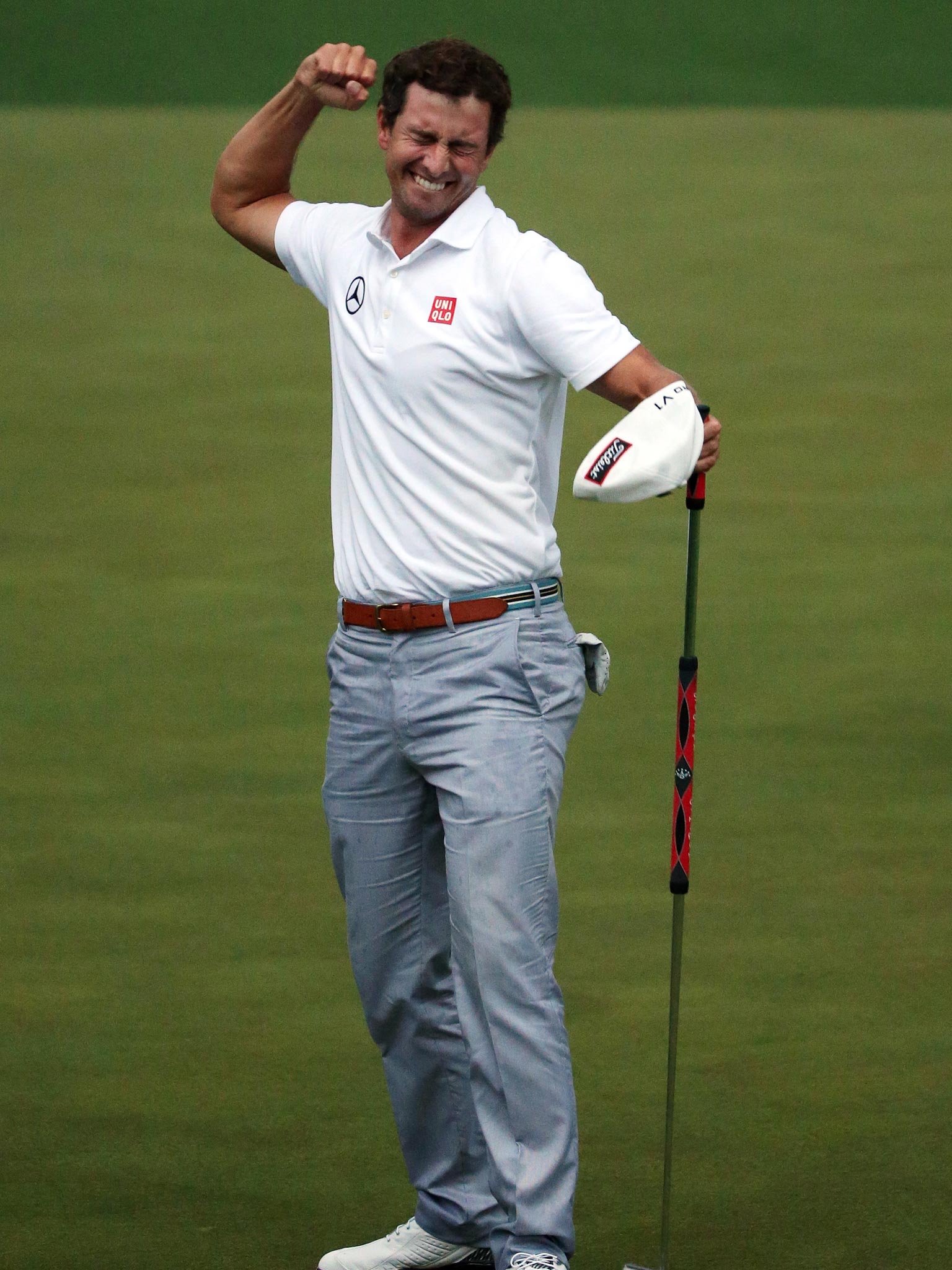 Adam Scott celebrates his birdie putt on the second sudden-death play-off hole to defeat Angel Cabrera in the Masters last year