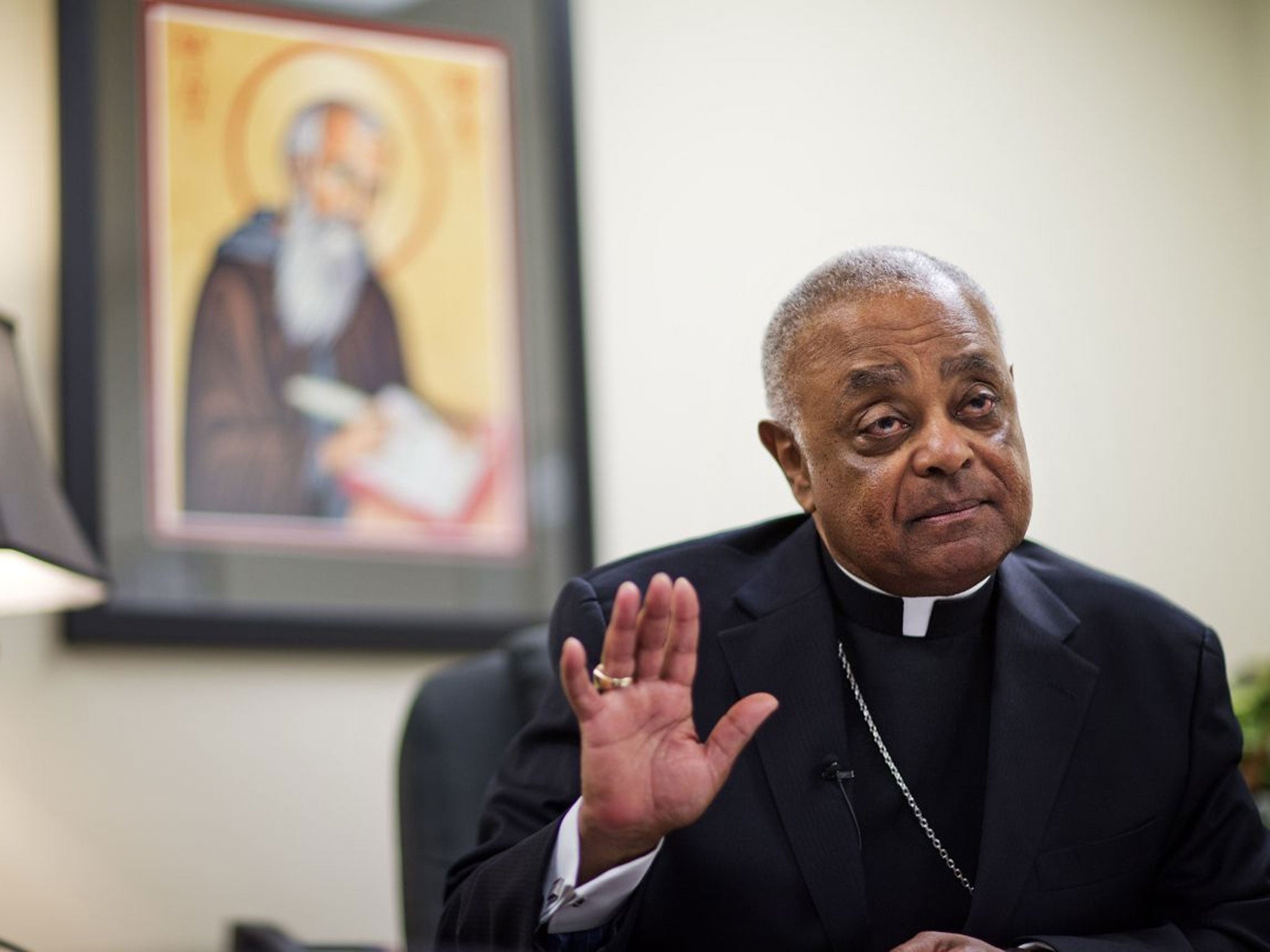 Atlanta Archbishop Wilton Gregory speaks during an interview in April 2014.