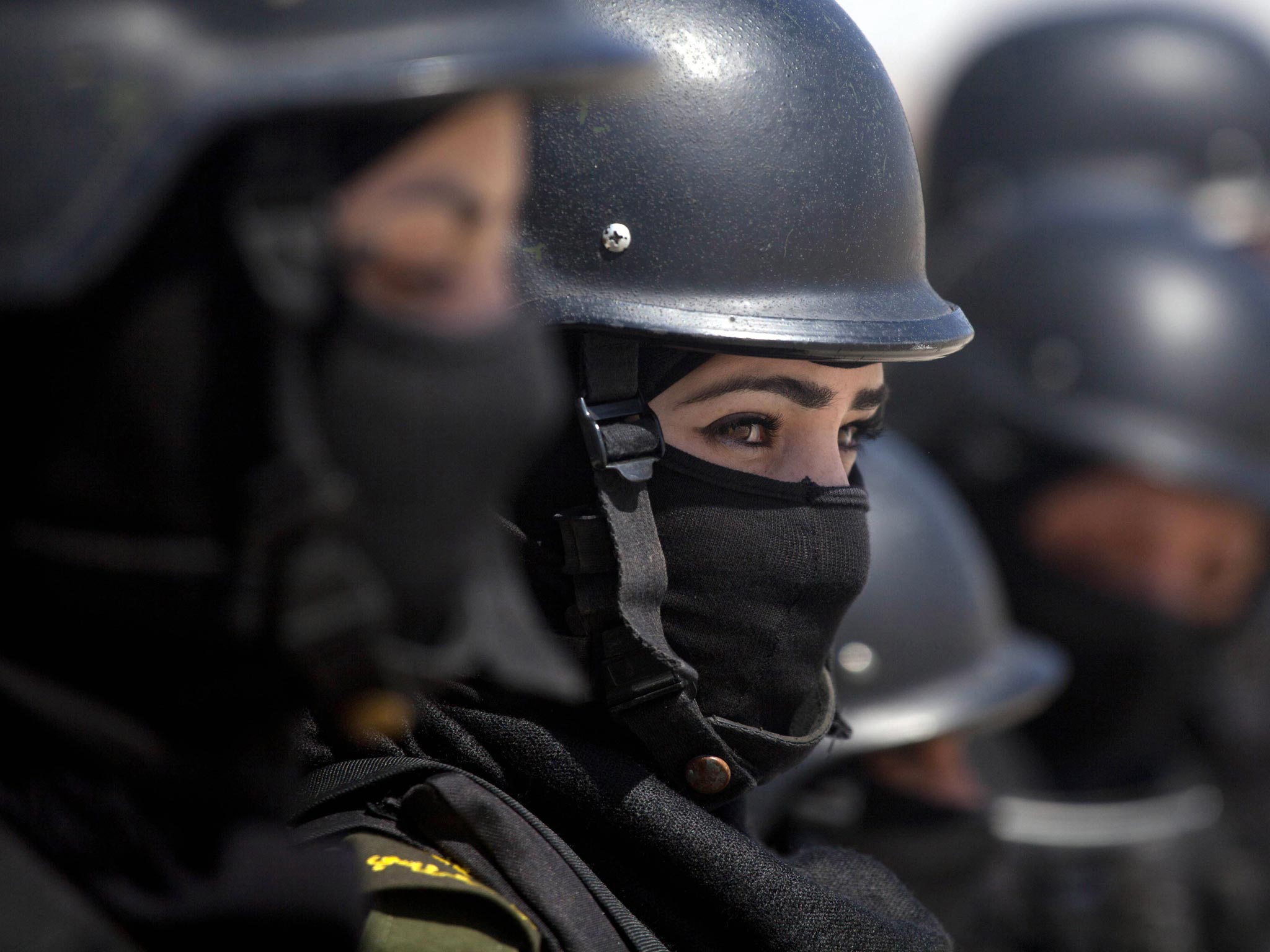 Palestinian women who will become a part of the elite Presidential Guard stand during a training in Jericho, West Bank