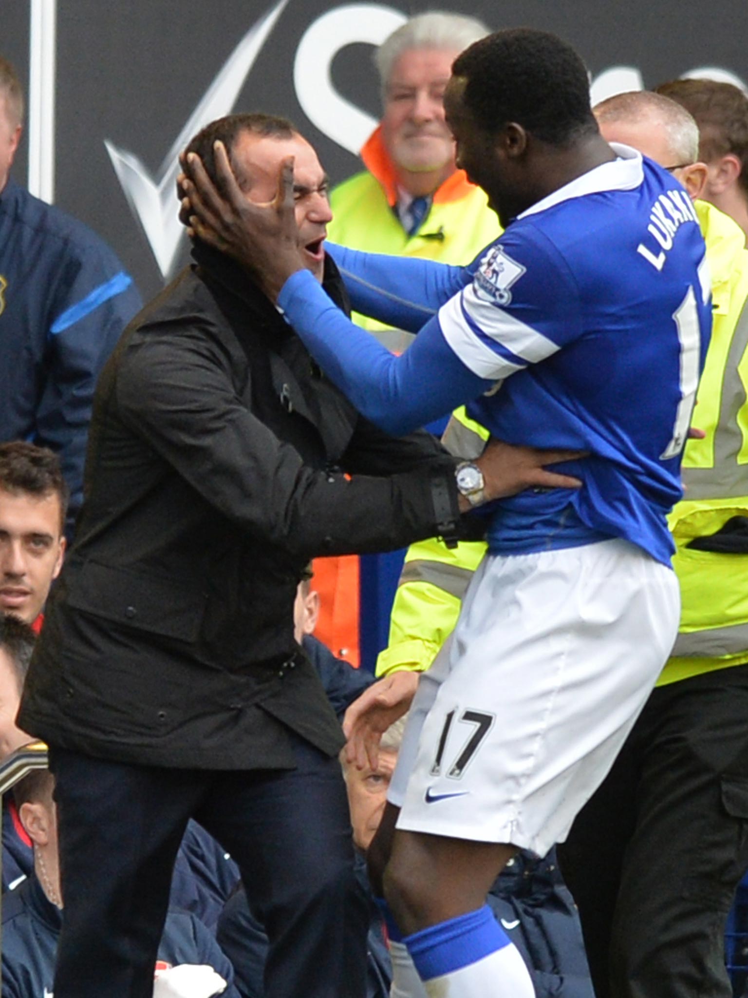 Romelu Lukaku celebrates with his manager Roberto Martinez after scoring against Arsenal