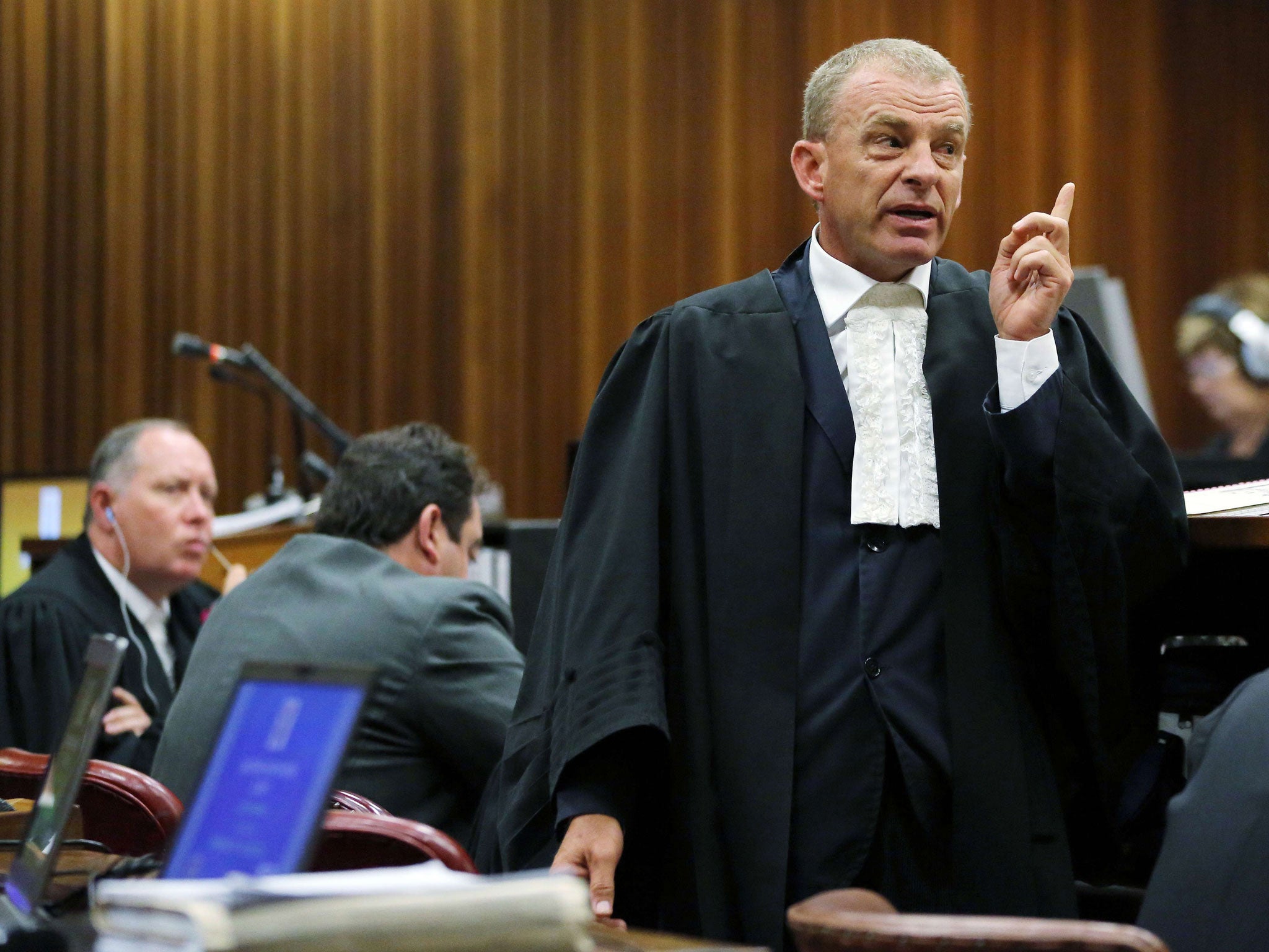 State Prosecutor Gerrie Nel speaks as he cross-examines