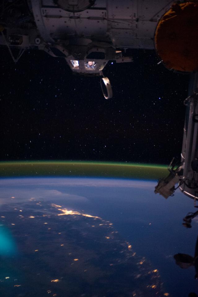 What the cupola looks like from the outside. Nasa astronaut Ron Garan looks down at the night view of Australia.