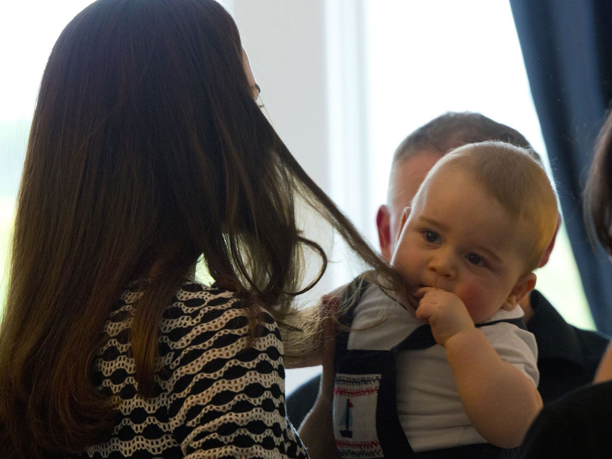 Prince George chews hair
