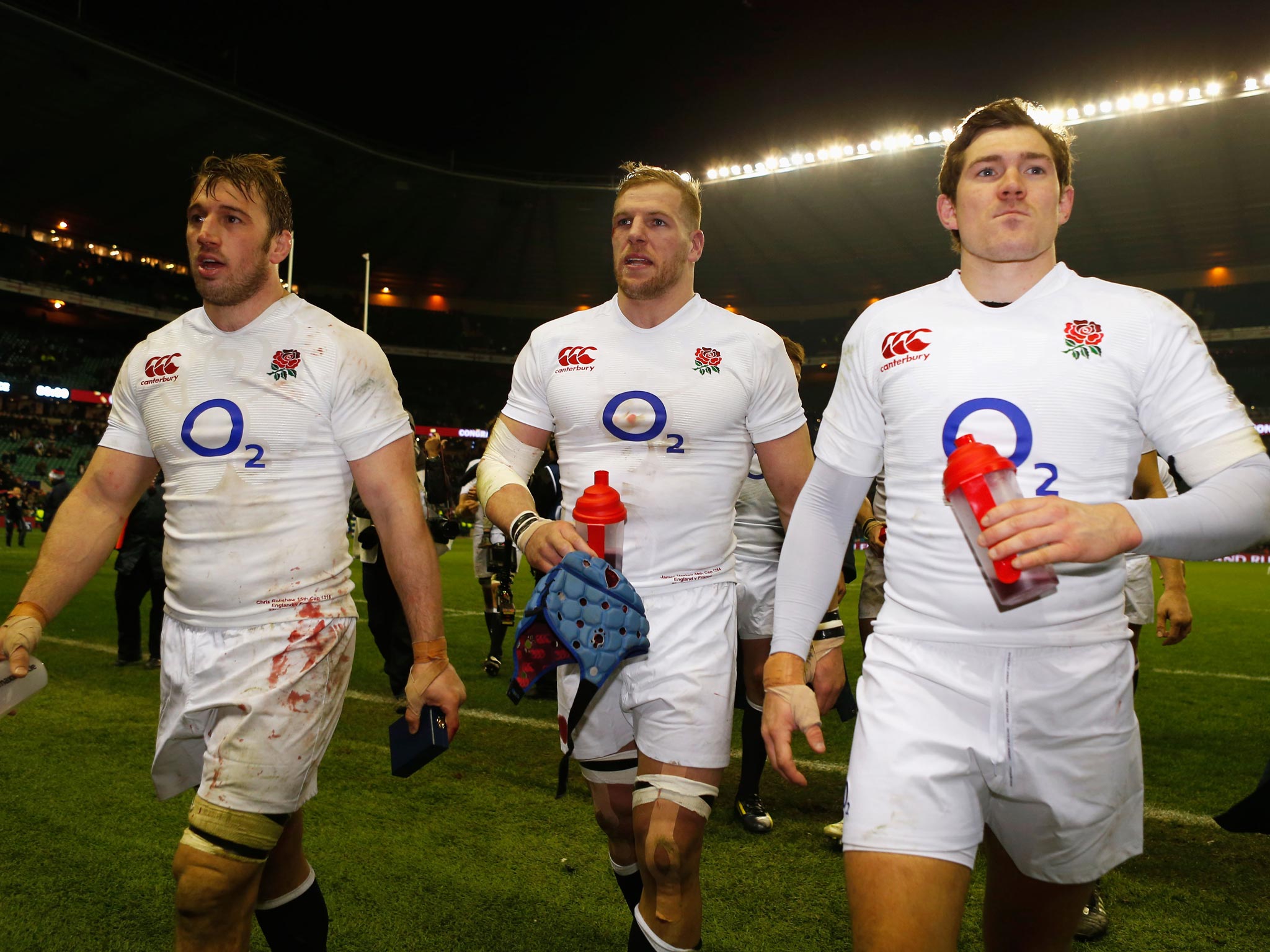 Robshaw, Haskell and Alex Goode leave the Twickenham pitch after last year's victory over France