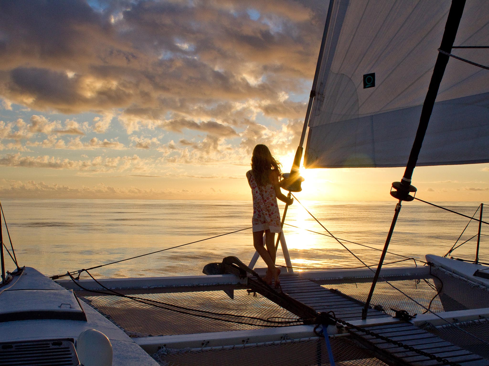 Maia aboard a sailing boat