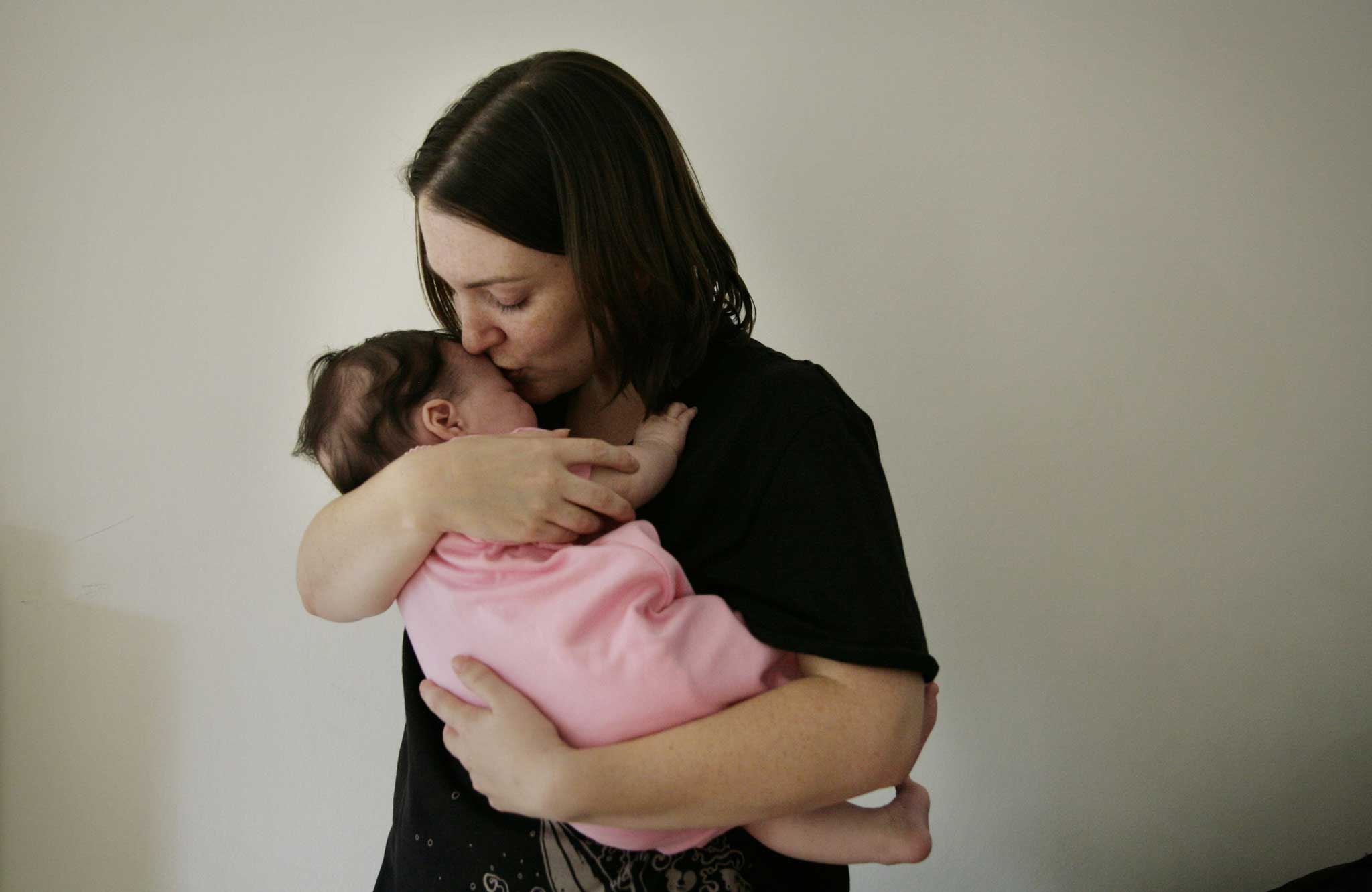 Elliot Guy's partner, Amy Smith, and their daughter, Eleanor in 2008