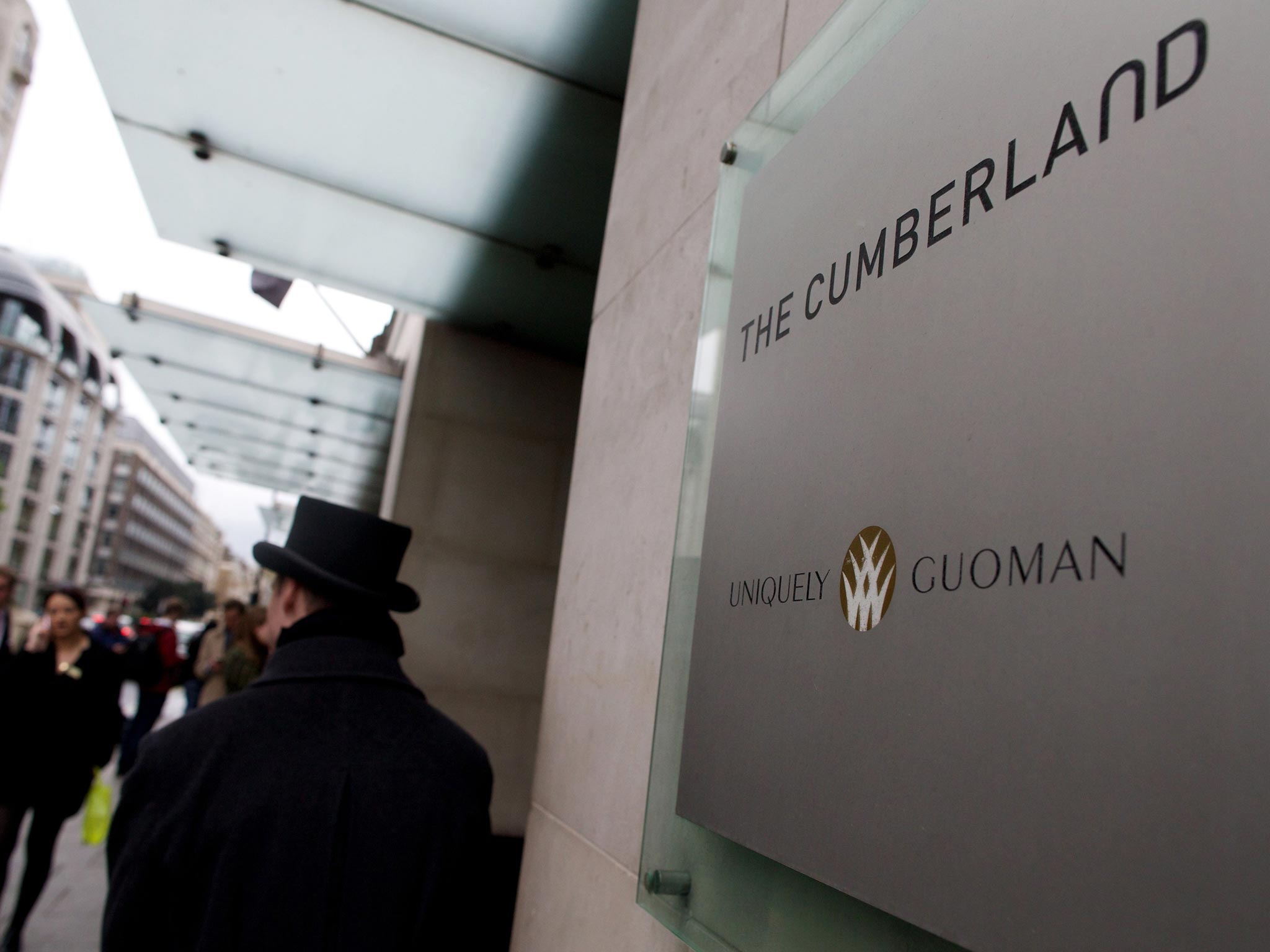 Three wealthy tourists were bludgeoned in a hammer attack after disturbing an intruder in their room at the four-star Cumberland Hotel near Marble Arch