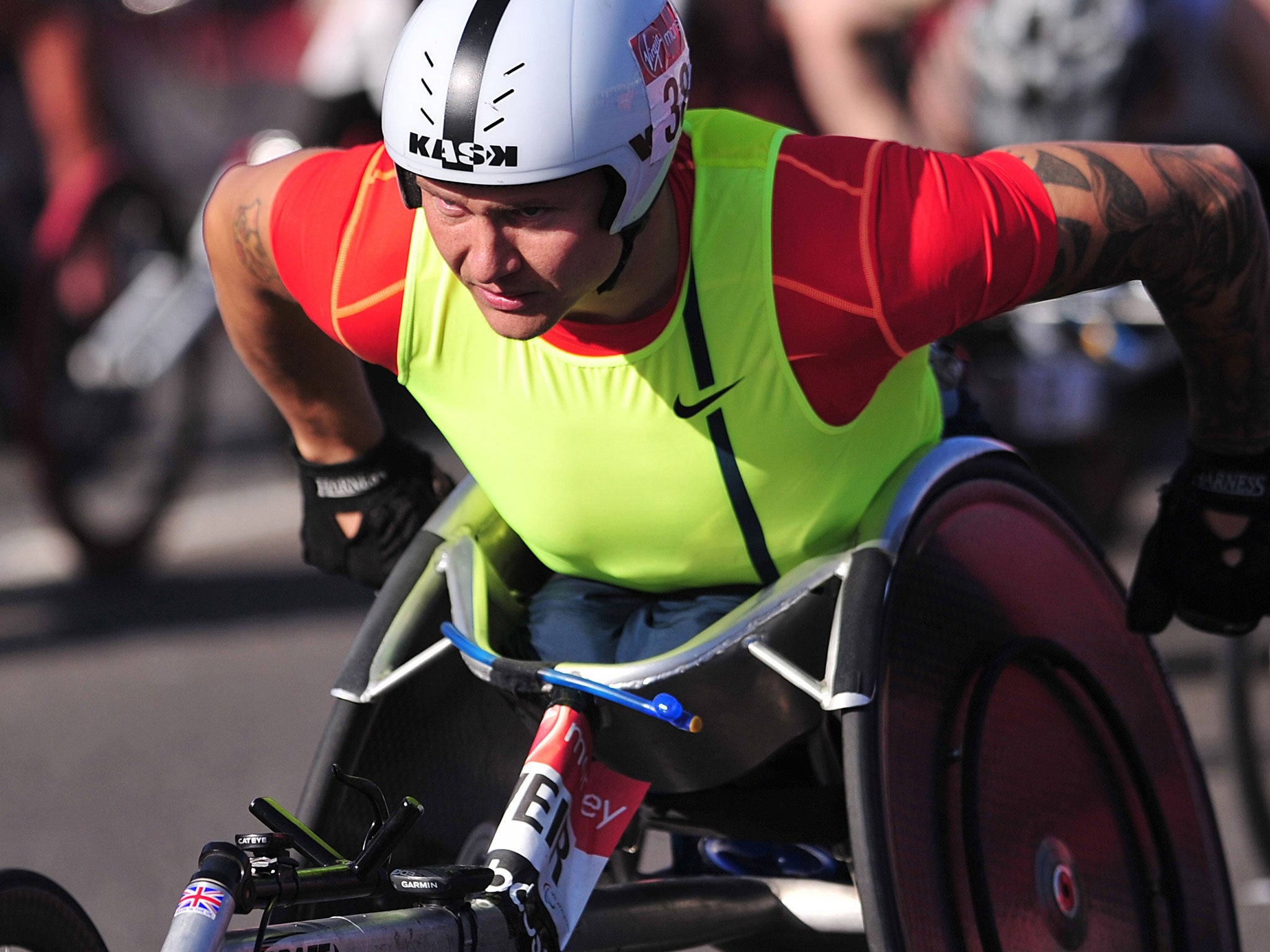 British paralympic wheelchair athlete David Weir takes part in the 2014 London Marathon near Blackheath