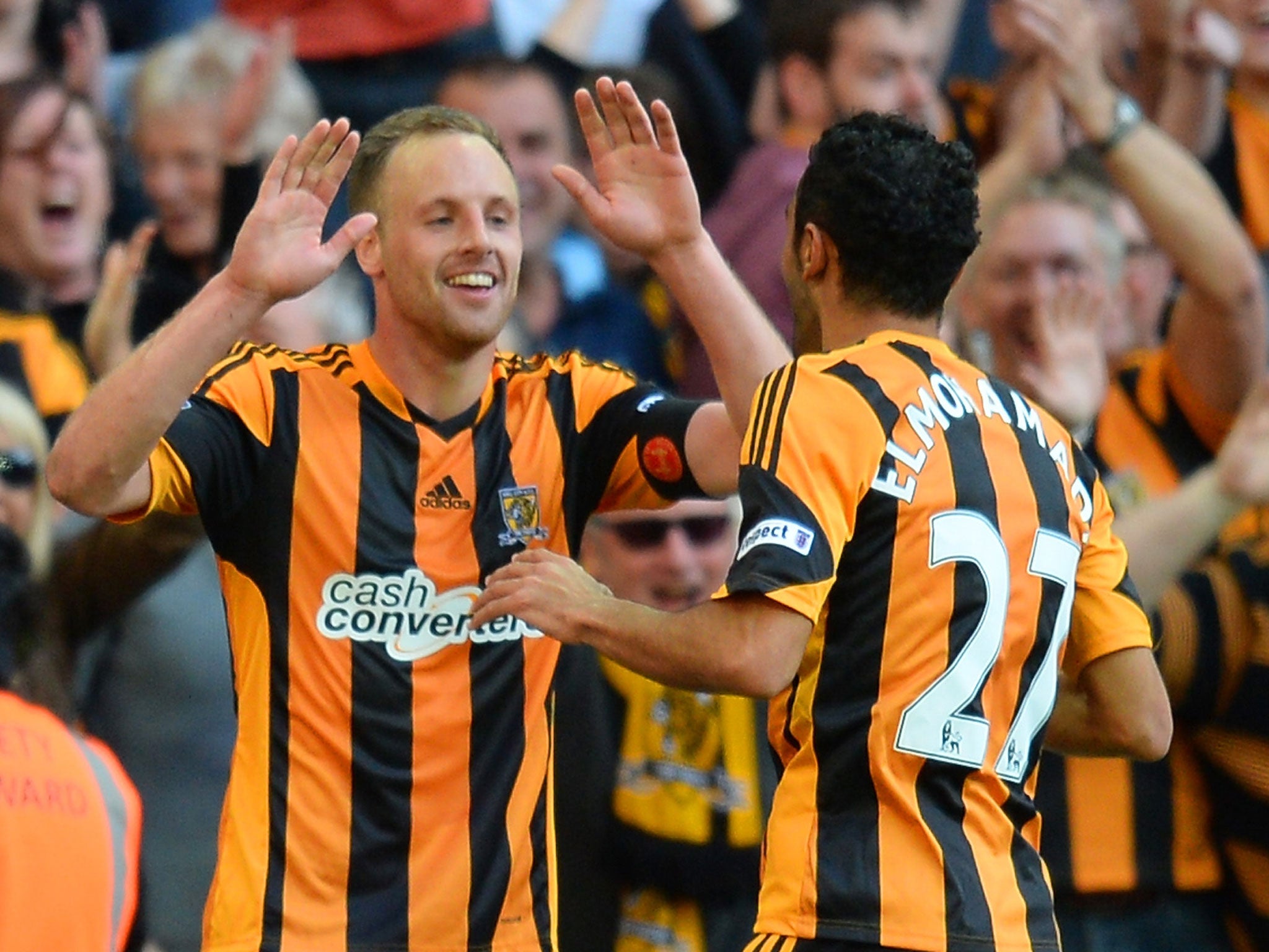 Hull's David Meyler (left) celebrates scoring their fifth goal with Ahmed Elmohamady