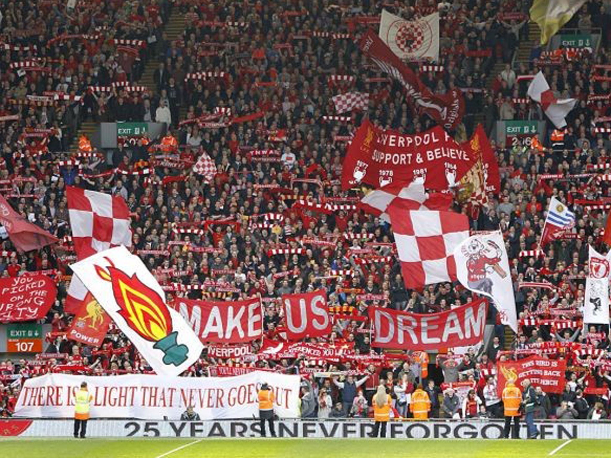 Liverpool fans display banners in the stands in remembrance of the 96 Liverpool fans that lost their lives in the Hillsborough disaster