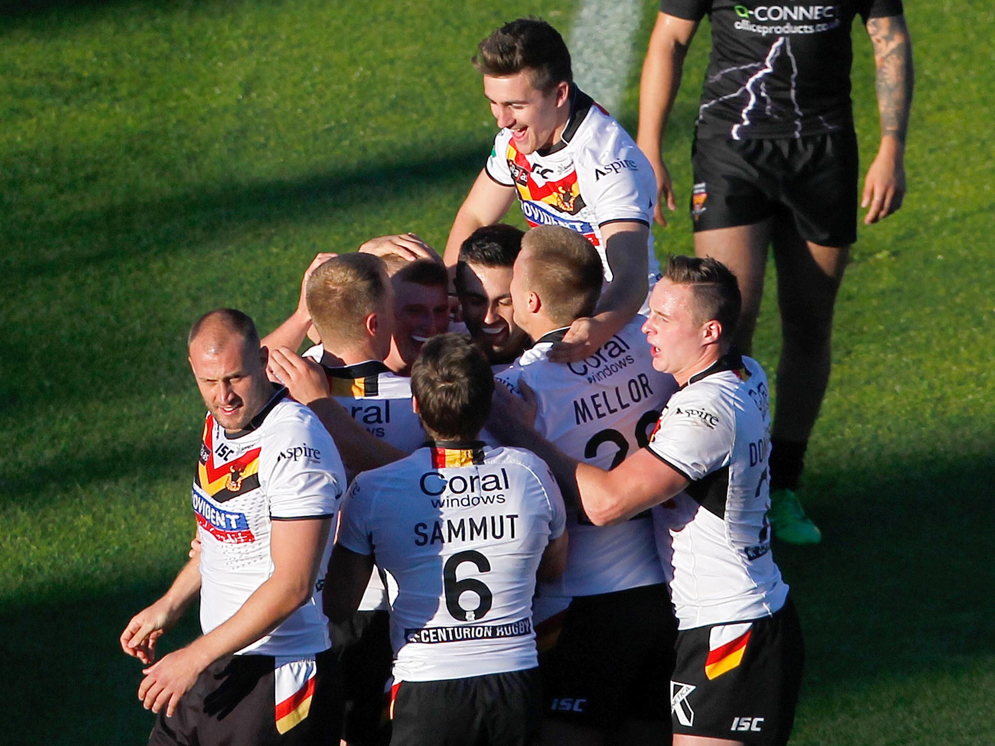 Danny Addy of Bradford and team-mates celebrate his try during the Super League match between Bradford Bulls and Huddersfield Giants