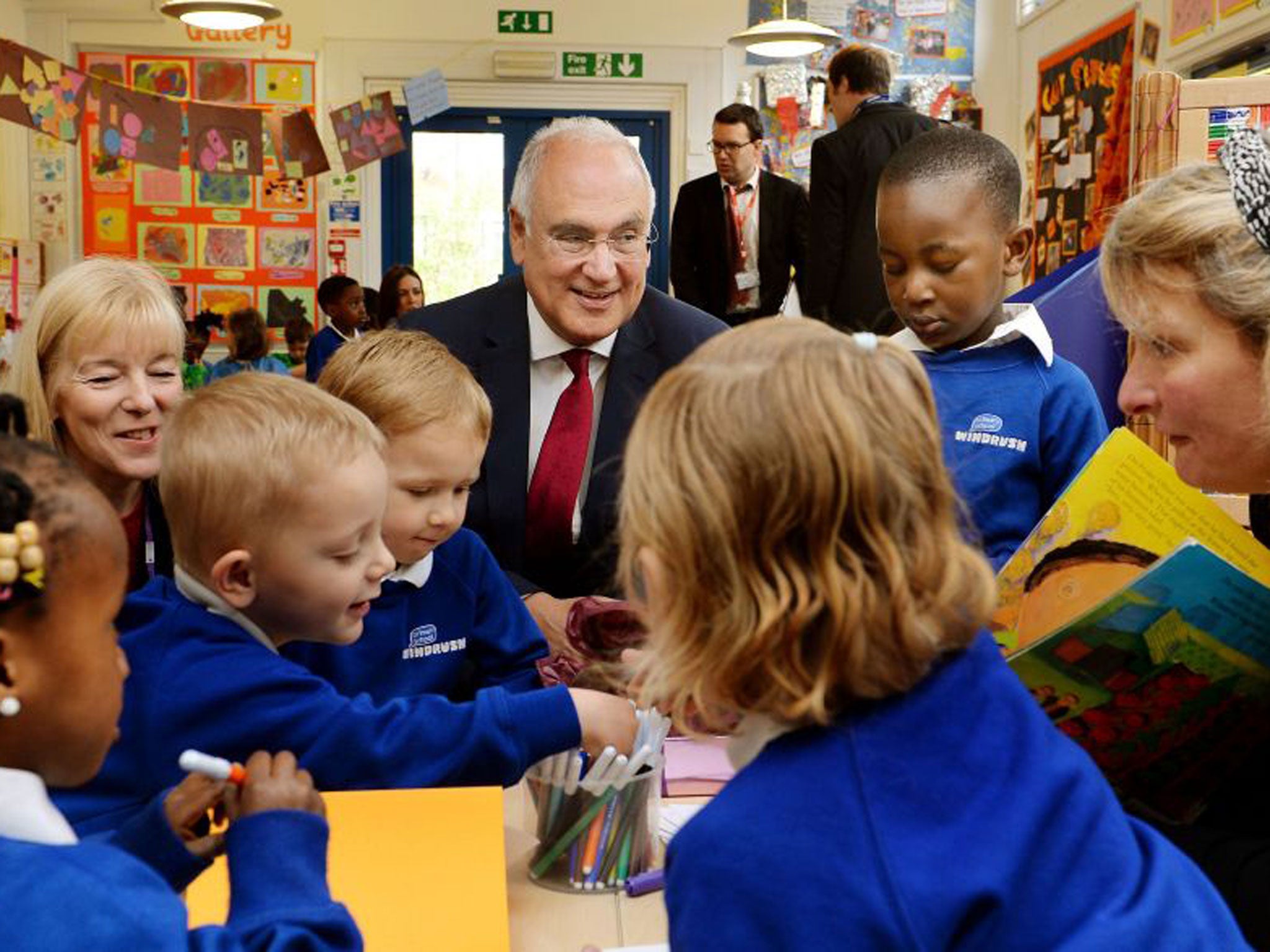 Chief schools inspector Sir Michael Wilshaw, centre, has said he is reviewing the role of private contractors in carrying out school inspections