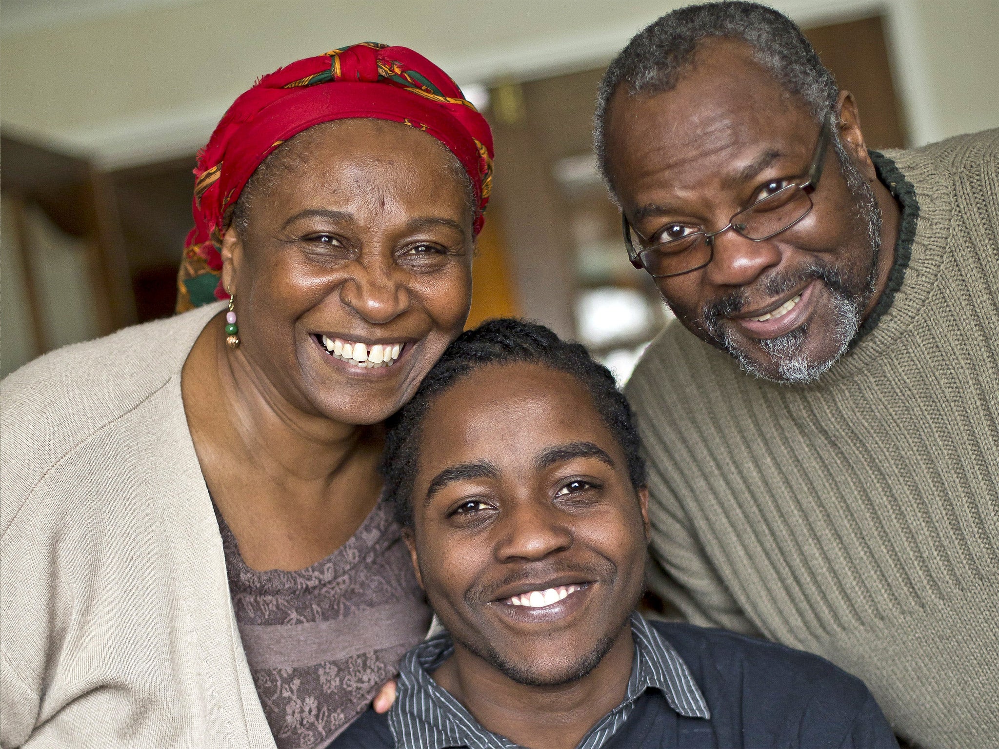 Hosts with the most: Merrill and David Nelson with Zubairi Sentongo