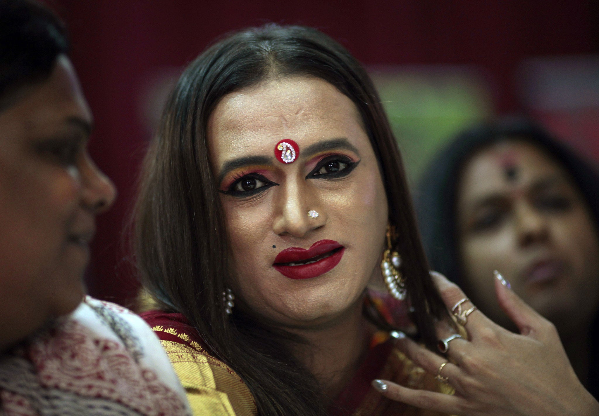 Transgender activist Laxmi Narayan Tripathi, seen here attending a campaign meeting to discuss ways of achieving equality (AP)