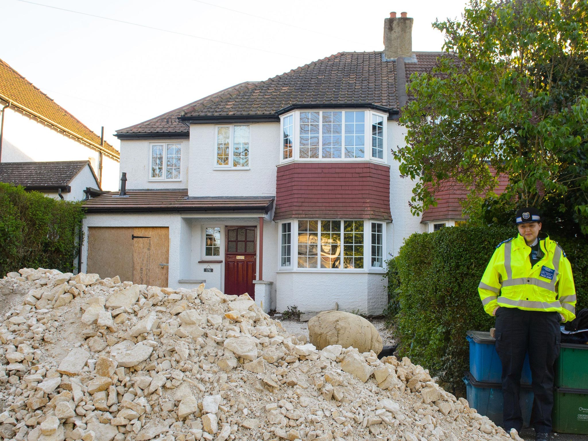 The house on Riddlesdown Road, in Purley, where builders have uncovered human remains whilst carrying out work on the driveway