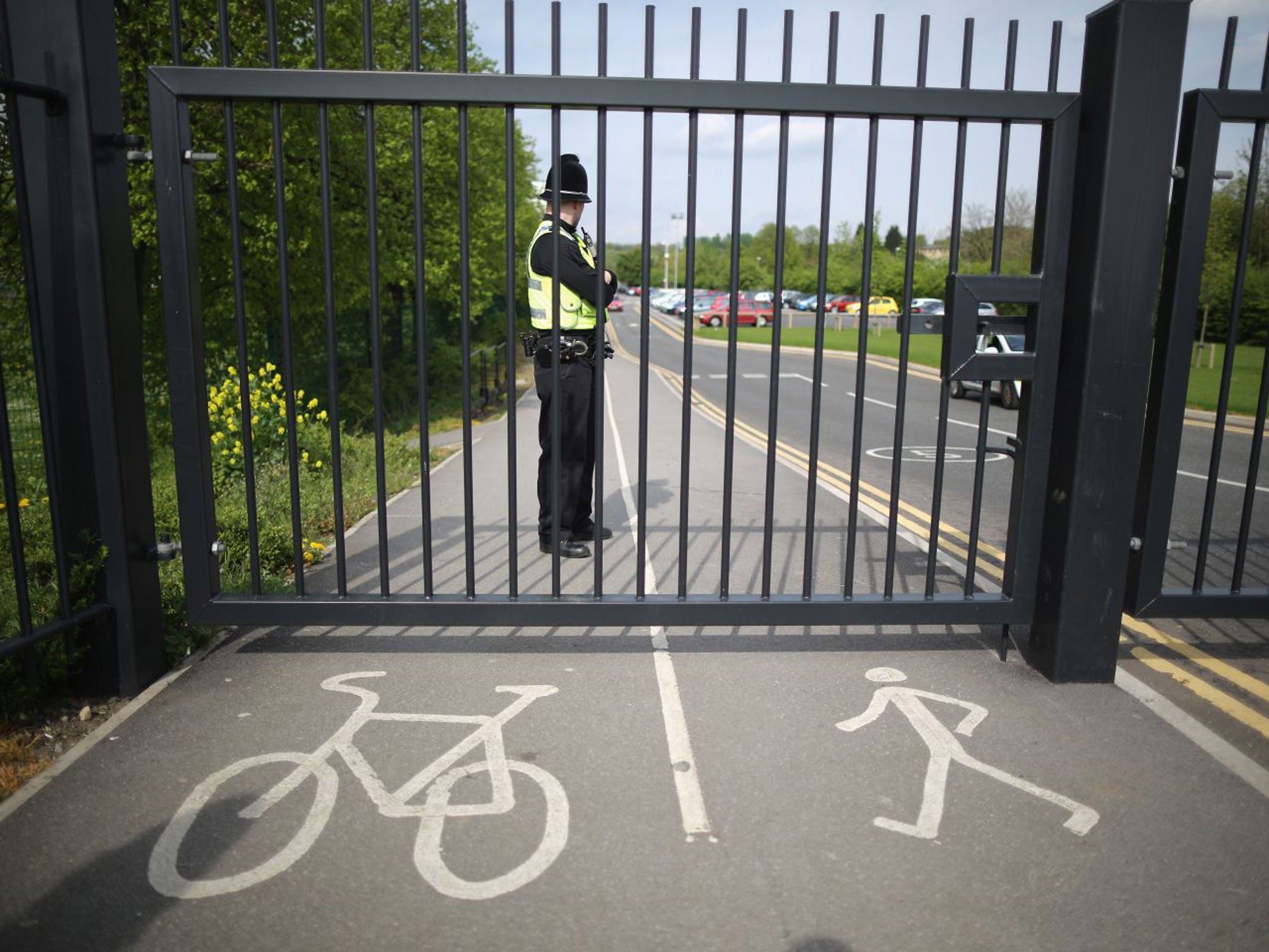 The gates to Corpus Christi Catholic College, where Anne Maguire was stabbed