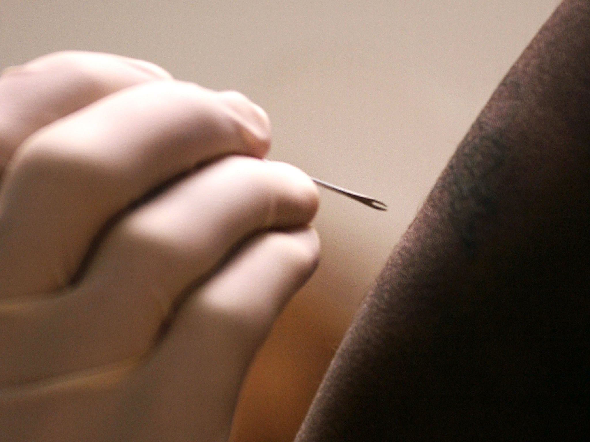 An American soldier receives the smallpox vaccine
