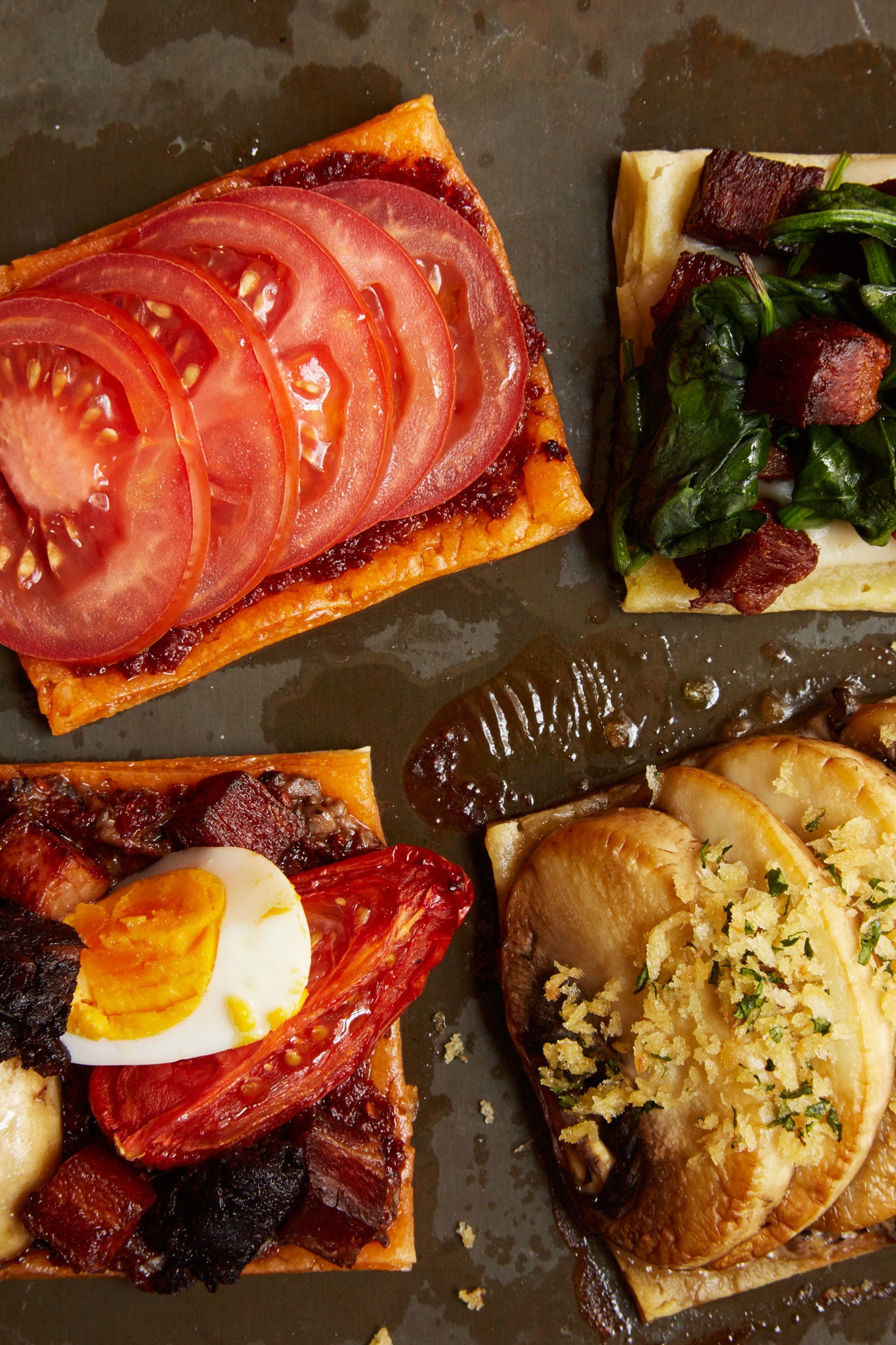 Clockwise from top left: tomato tart; sea spinach and mushroom tart; field mushroom tart; full English tart