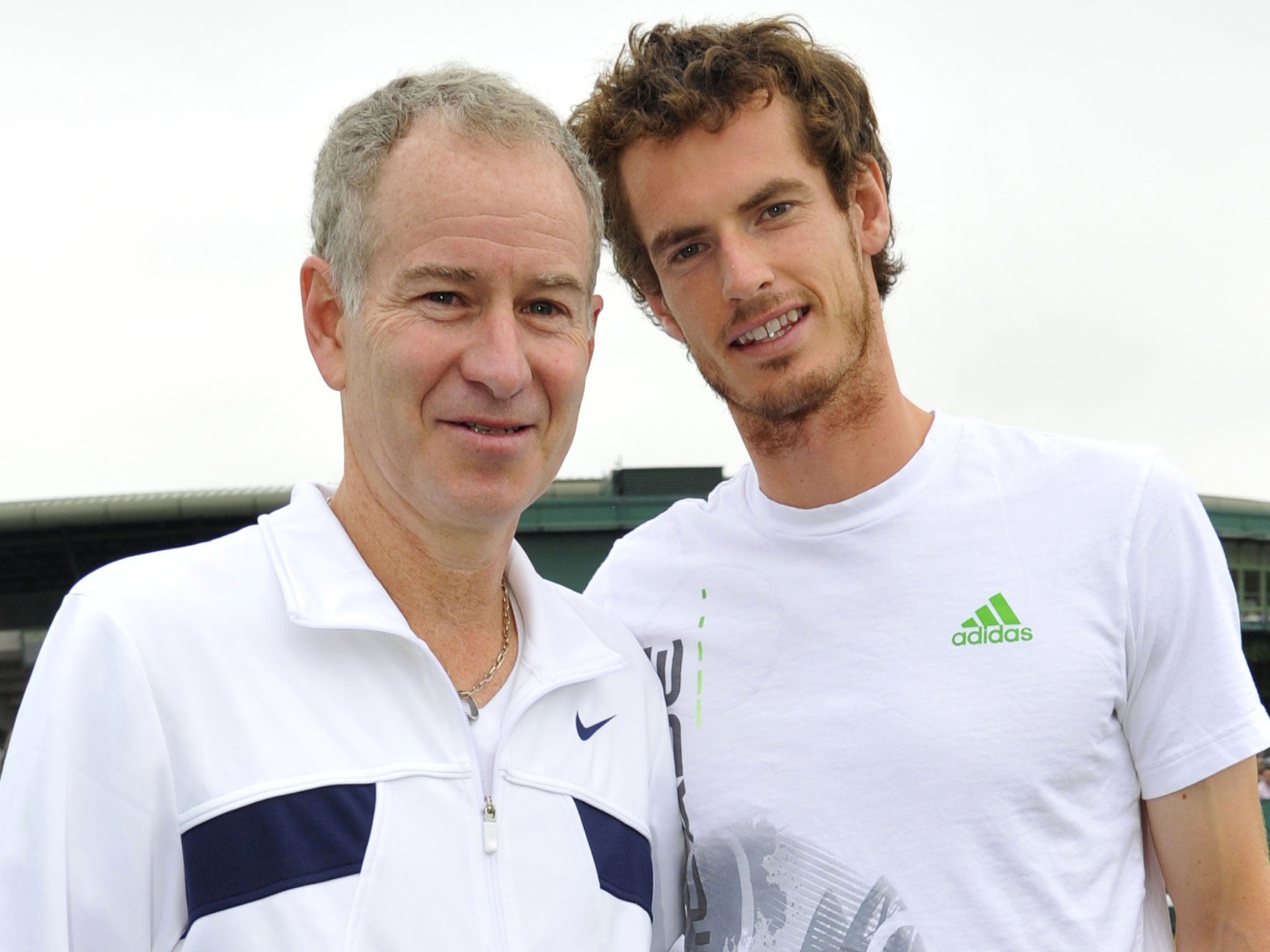 John McEnroe and Andy Murray pictured in 2011