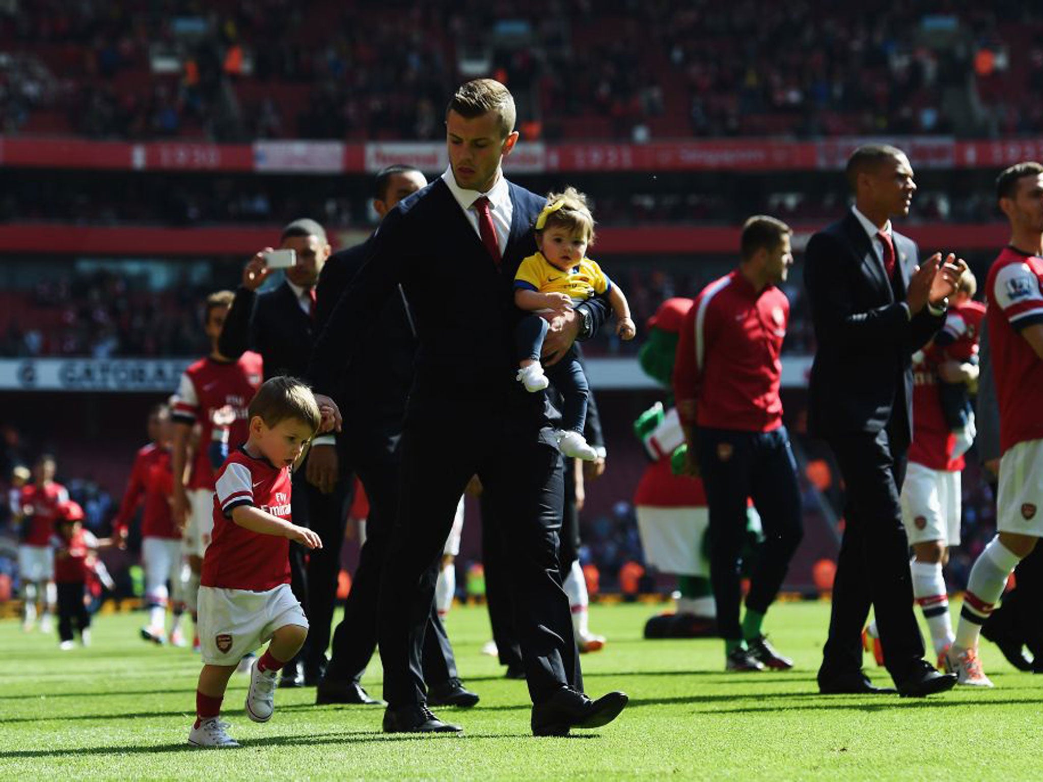 Arsenal’s Jack Wilshere with Delilah and Archie