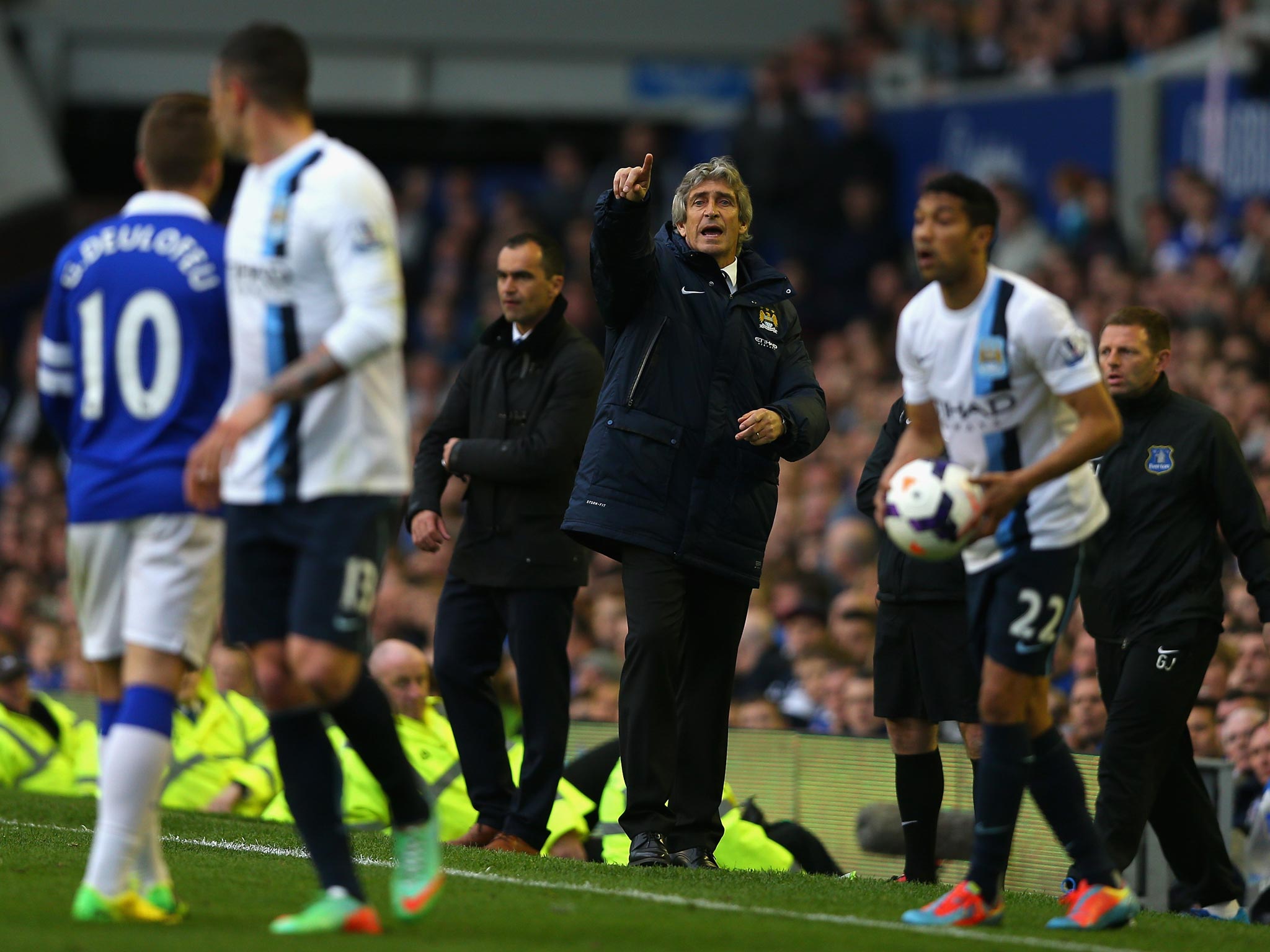 Manchester City Manager Manuel directs his side during the recent win over Everton