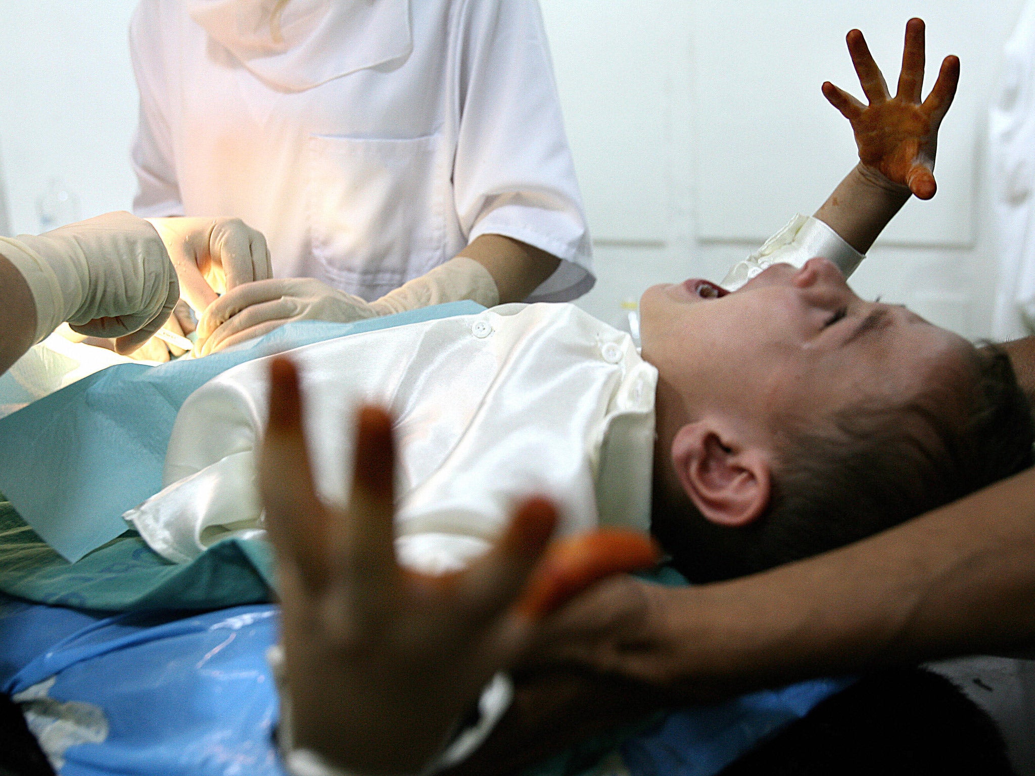 File photo shows a boy screaming during a circumcision at an Algerian hospital