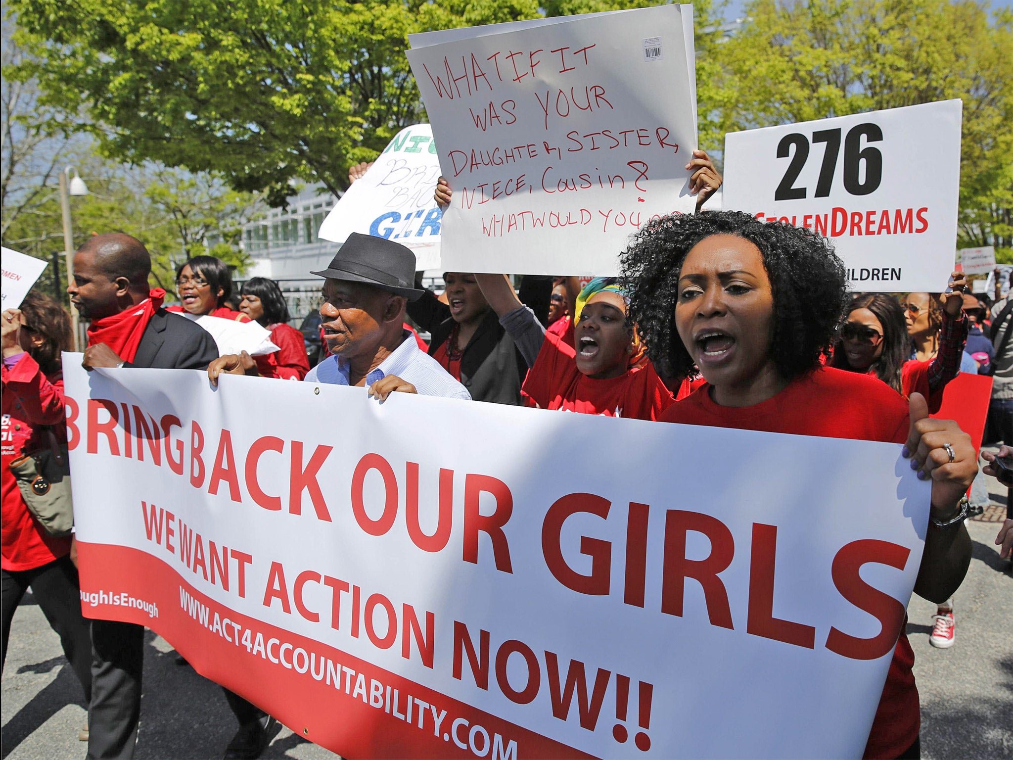 Protesters march in front of the Nigerian Embassy in Washington