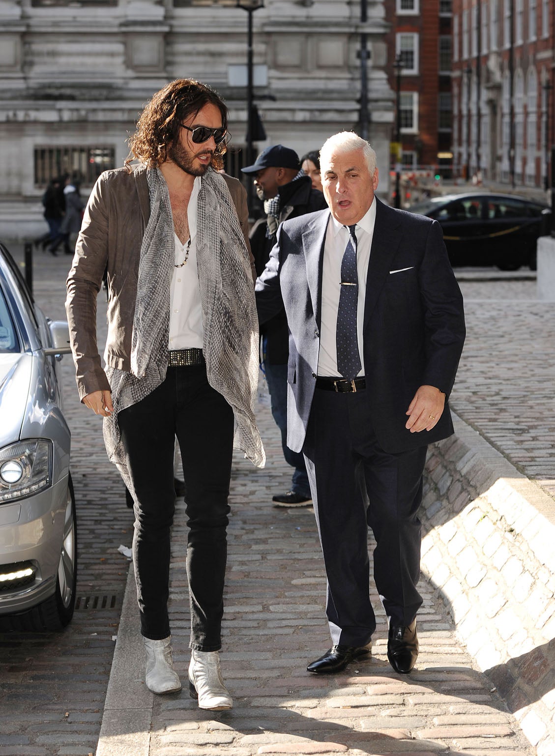 Russell Brand pictured with Mitch Winehouse at a memorial for his daughter, Amy Winehouse, last year.