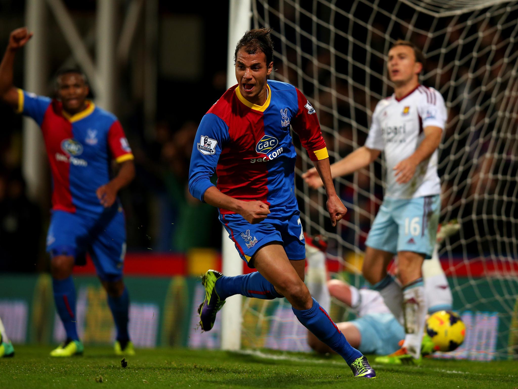 Chamakh celebrating a goal against West Ham