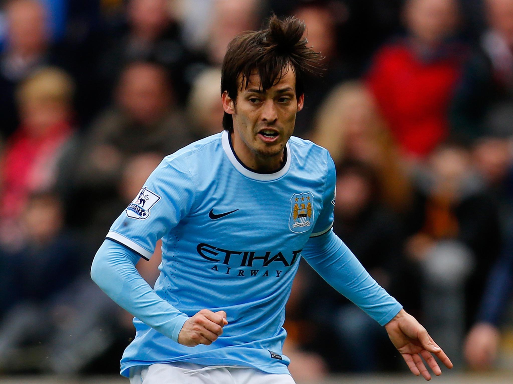 David Silva’s (left) trickery has helped Manchester City hit 100 Premier League goals