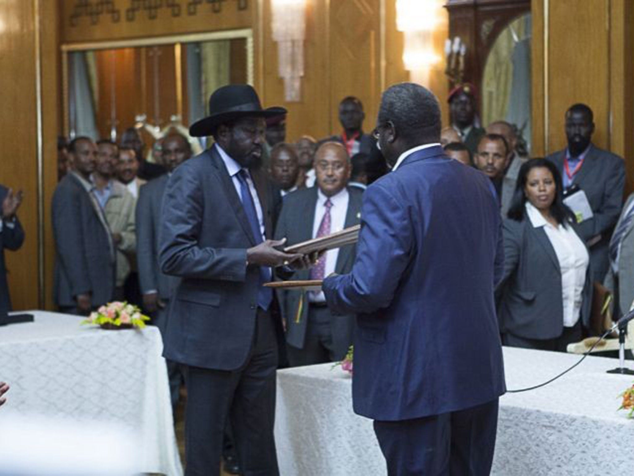 Salva Kiir (L), President of South Sudan, and Riek Machar (R), SPLM Opposition leader meeting in May last year