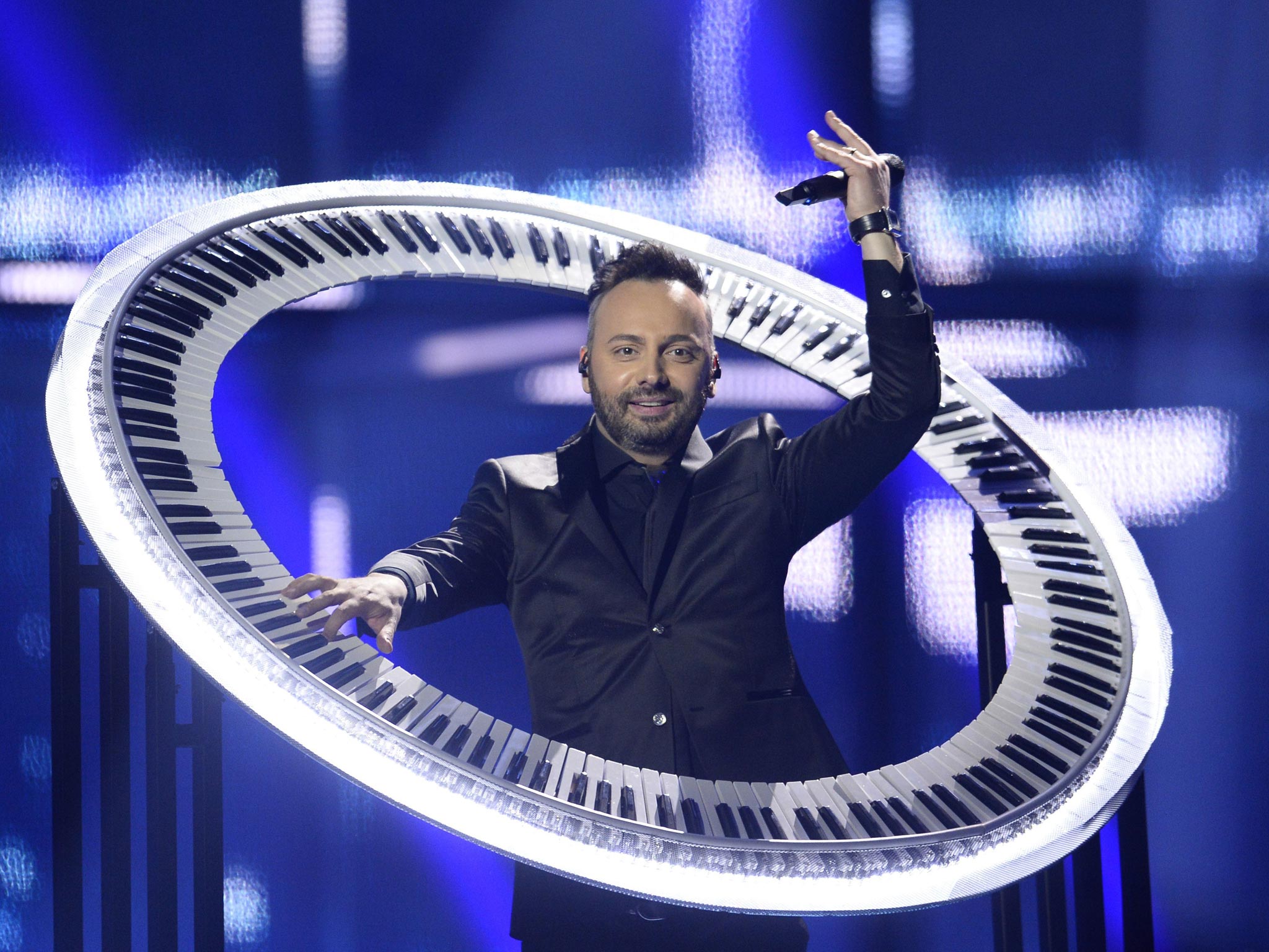 Ovi of Paula Seling & Ovi representing Romania performs during the Eurovision Song Contest 2014 Grand Final in Copenhagen, Denmark