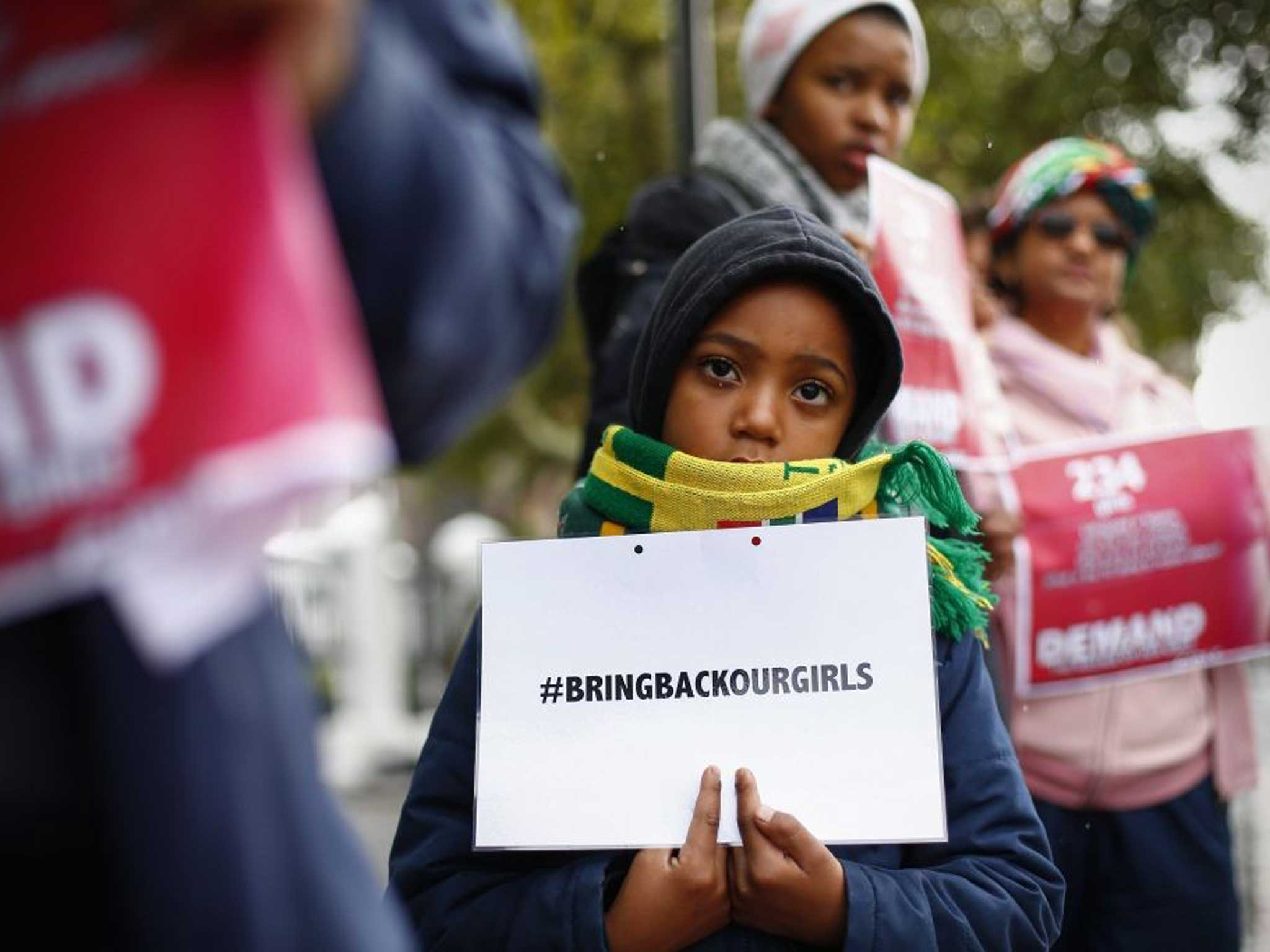 Global anger: Protesters in Cape Town yesterday join a global Twitter campaign to bring pressure to bear to secure the release of the Nigerian girls