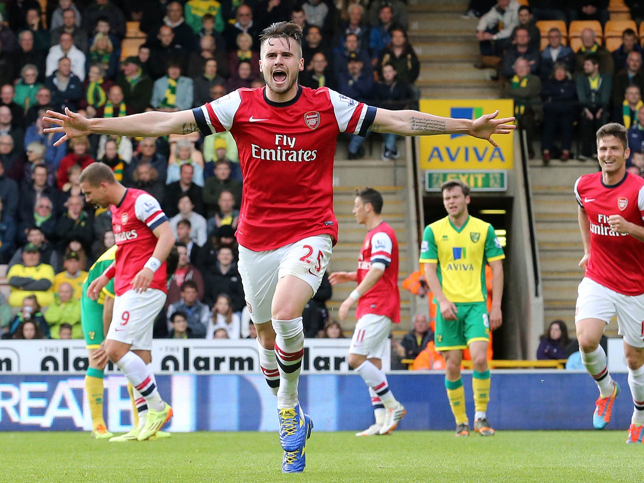 Carl Jenkinson celebrates scoring his first goal for Arsenal on the final day of the season against Norwich