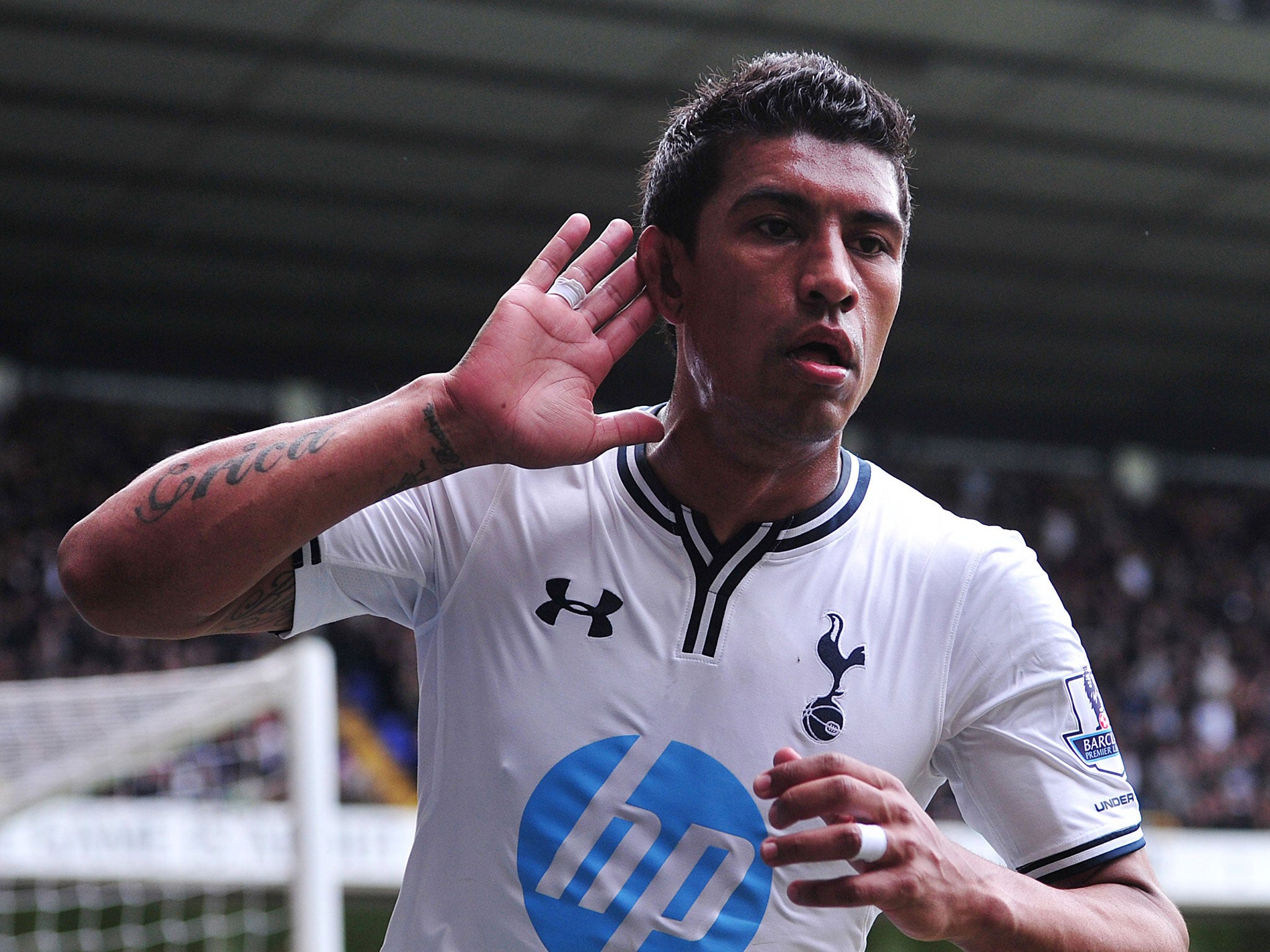 Paulinho celebrates after opening the scoring for Spurs