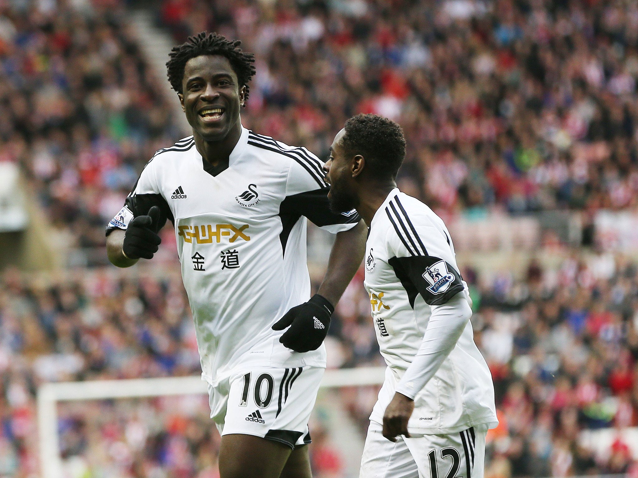 Wilfried Bony celebrates scoring the away side's third