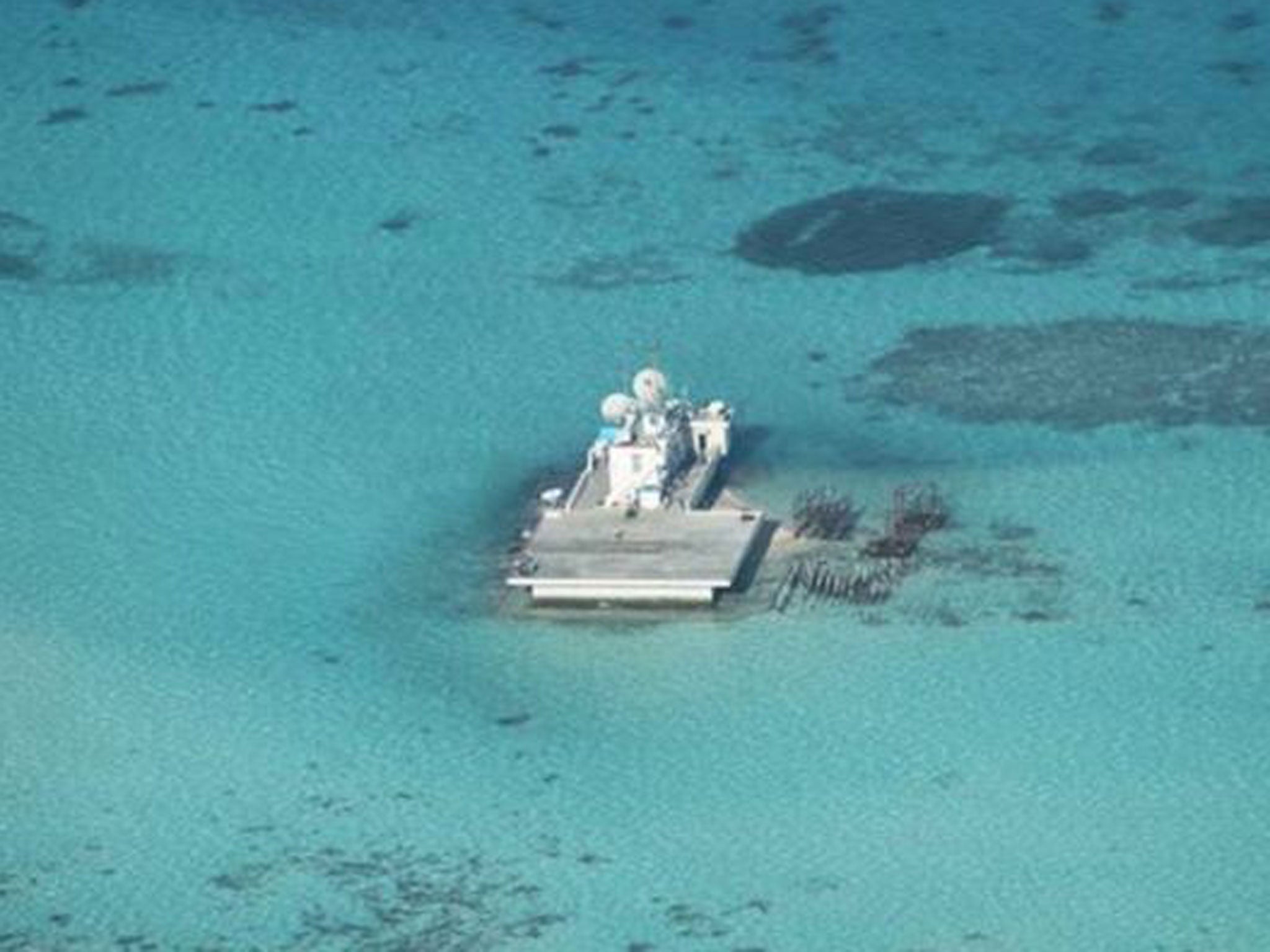 Chinese-made structures stand on the Johnson Reef, called Mabini by the Philippines and Chigua by China, in the Spratly Islands in South China Sea