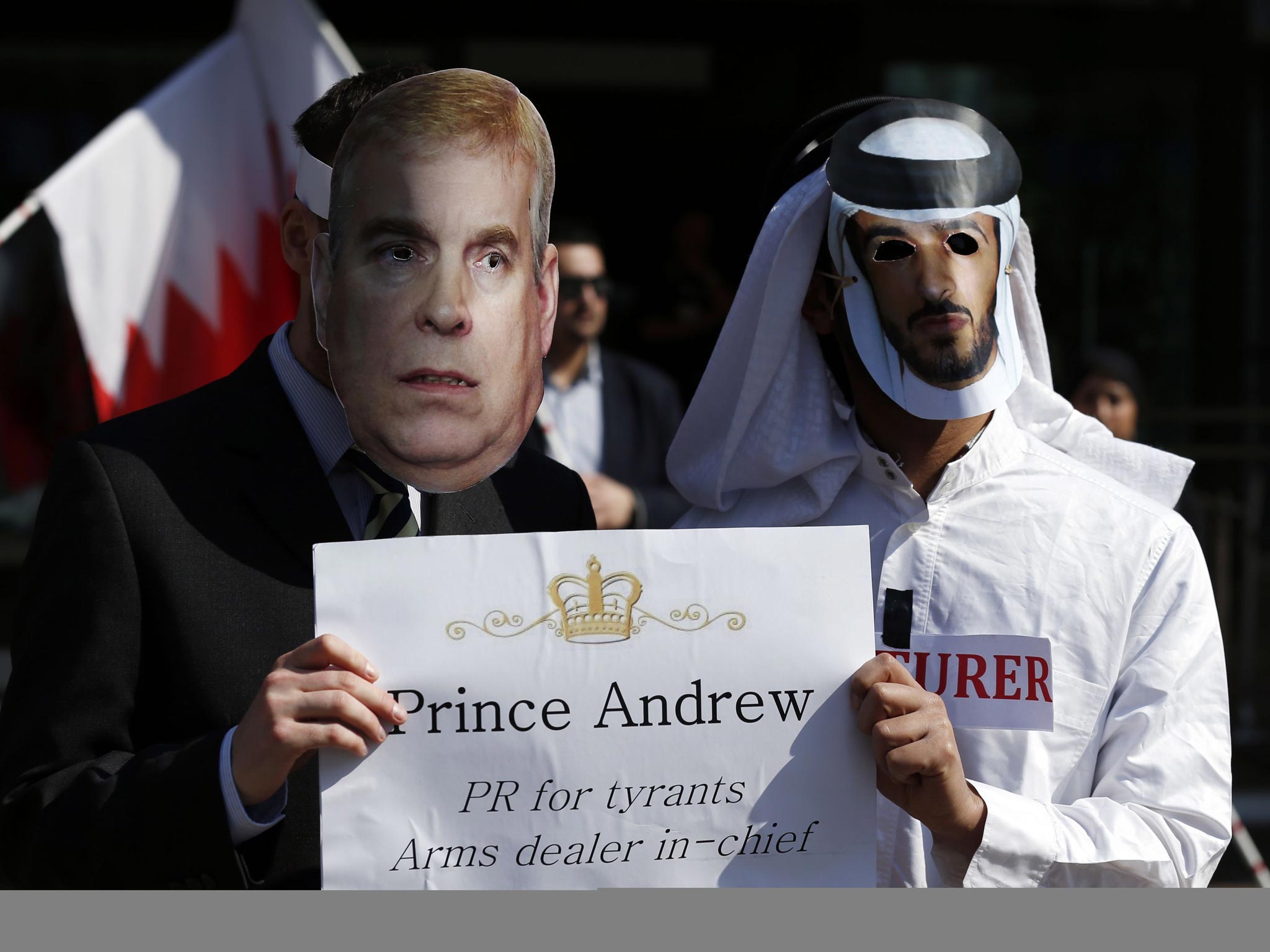 Activists gather outside the Queen Elizabeth II Conference Centre in central London